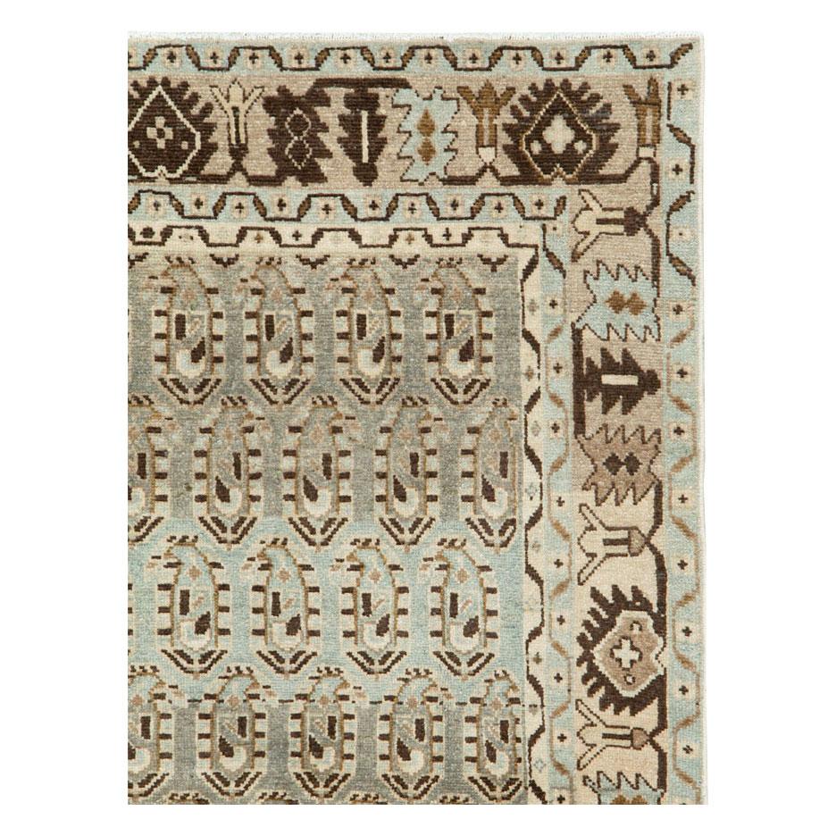 A vintage Persian Malayer accent rug handmade during the mid-20th century with medium scale geometric paisleys (botehs). This attractive rug is in cool and current colors such as slate-blue, beige, and browns.

Measures: 4' 6