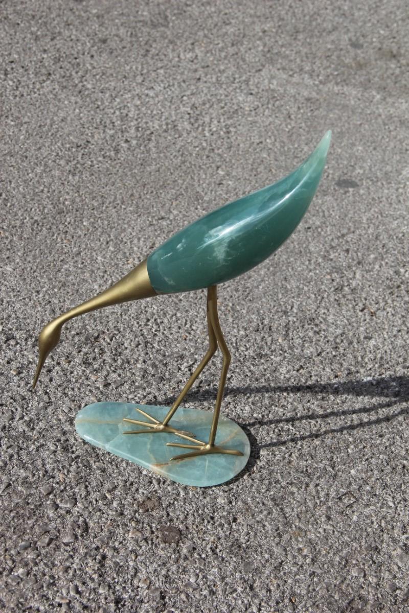 Elegant midcentury heron in onyx and Italian design 1950s brass parts green color gold.