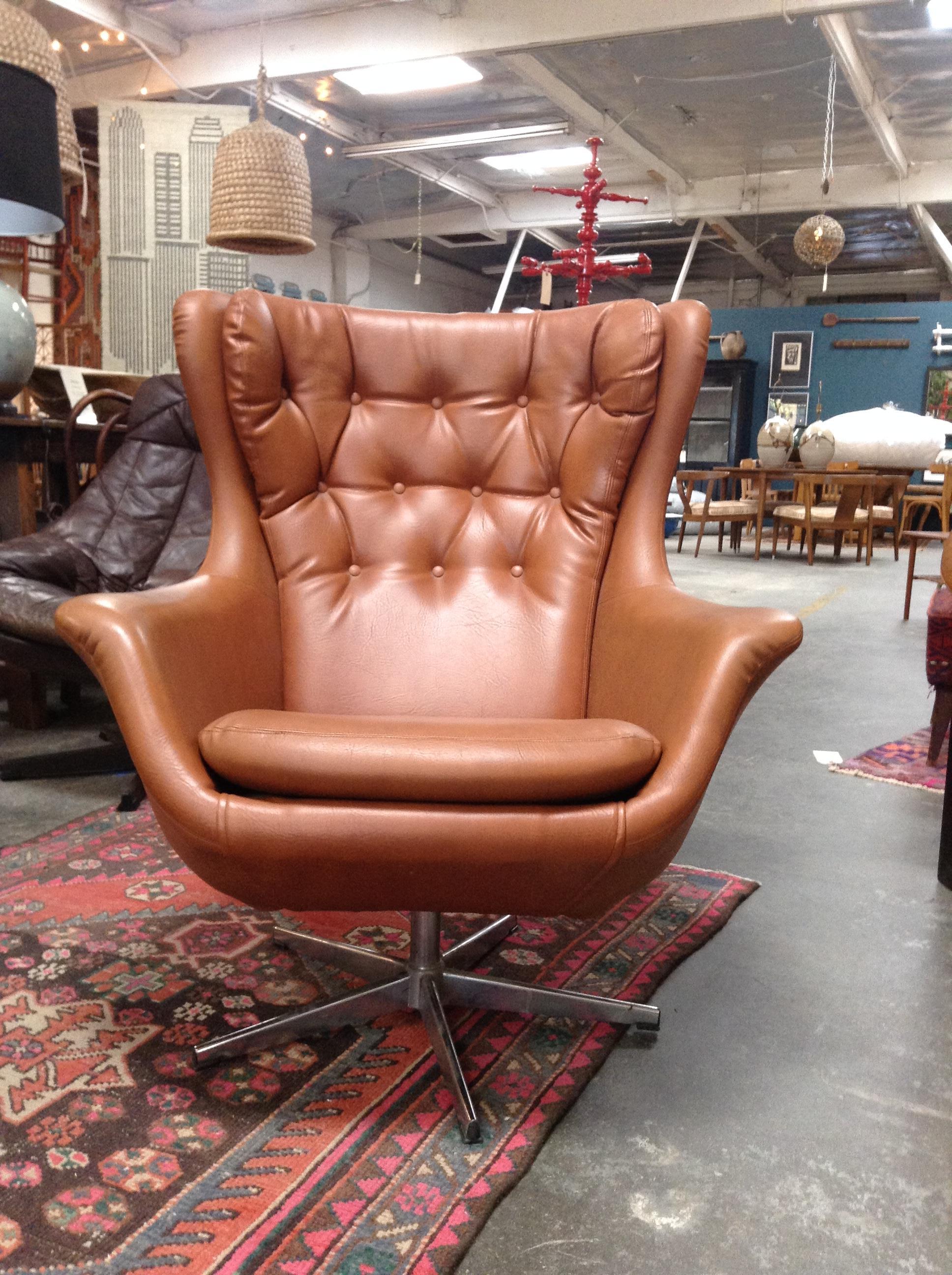 Beautiful midcentury HW Klein chair in light brown. This piece is comfortable and Classic, fits great in almost any space.