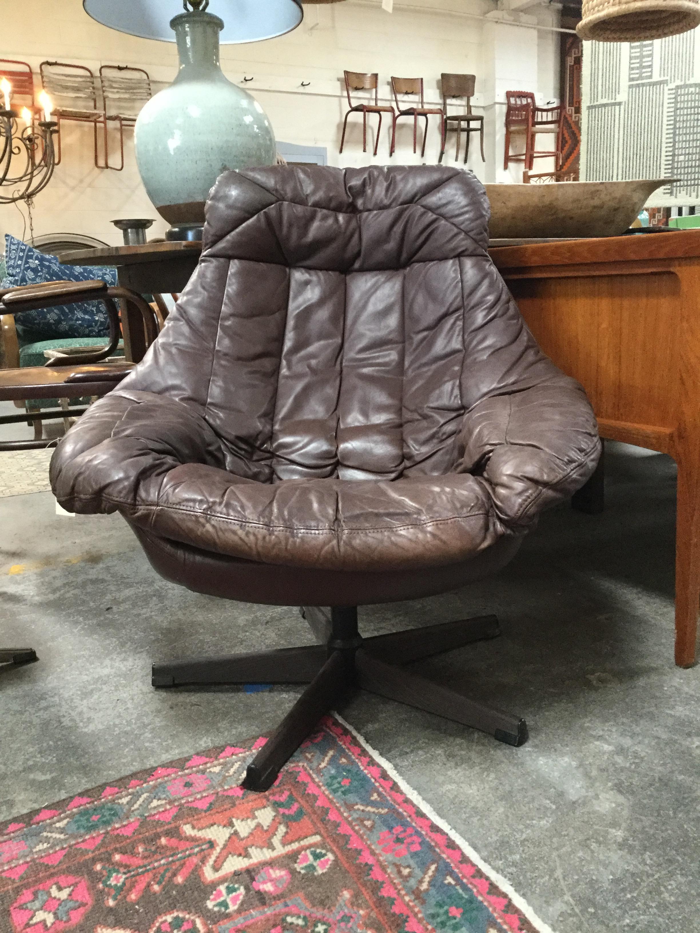 Vintage HW Klein dark brown leather lounge chair in great condition. Classic midcentury design that's a cool (and comfy) statement in any space.