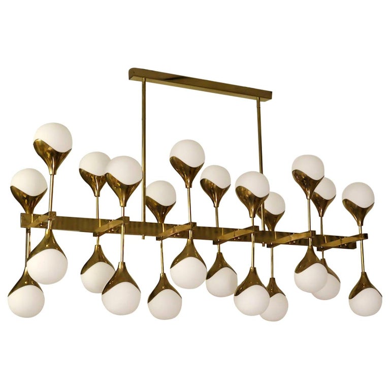 Italian brass and glass chandelier, 1980, offered by Hannau