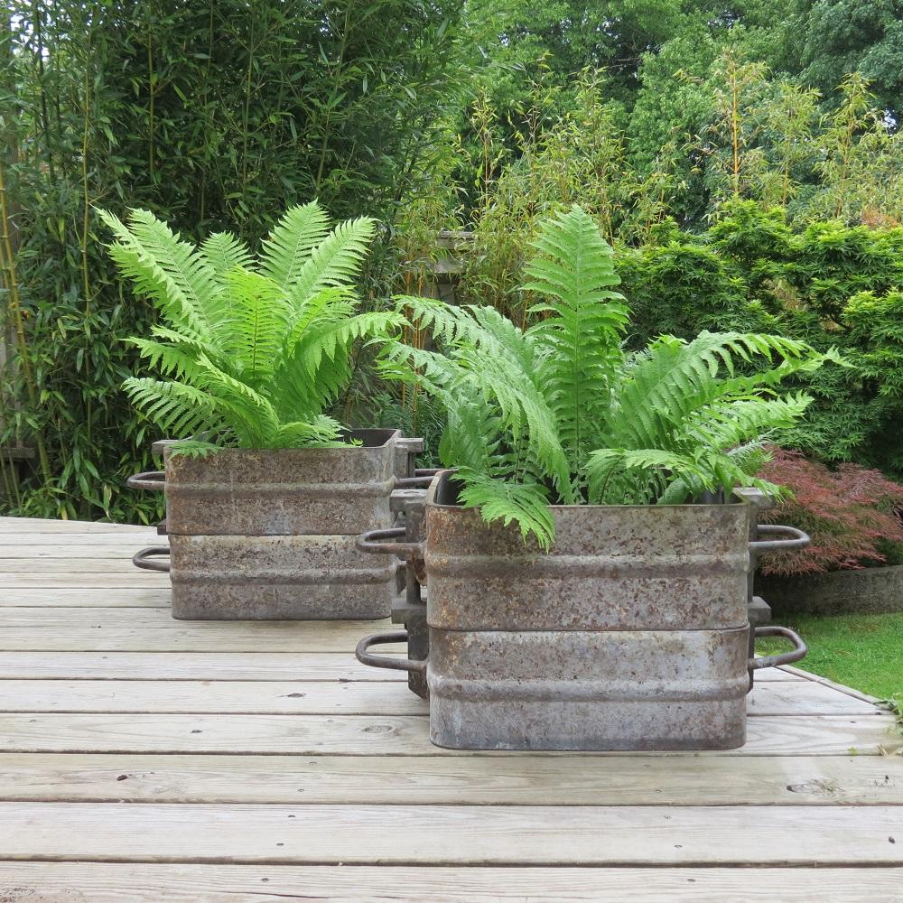 Pair of mid-century industrial metal sand casting flask large garden planters. 

Pair of industrial sand casting flasks which would make a very interesting planter or raised bed. Great for an Industrial look in the garden and would add real