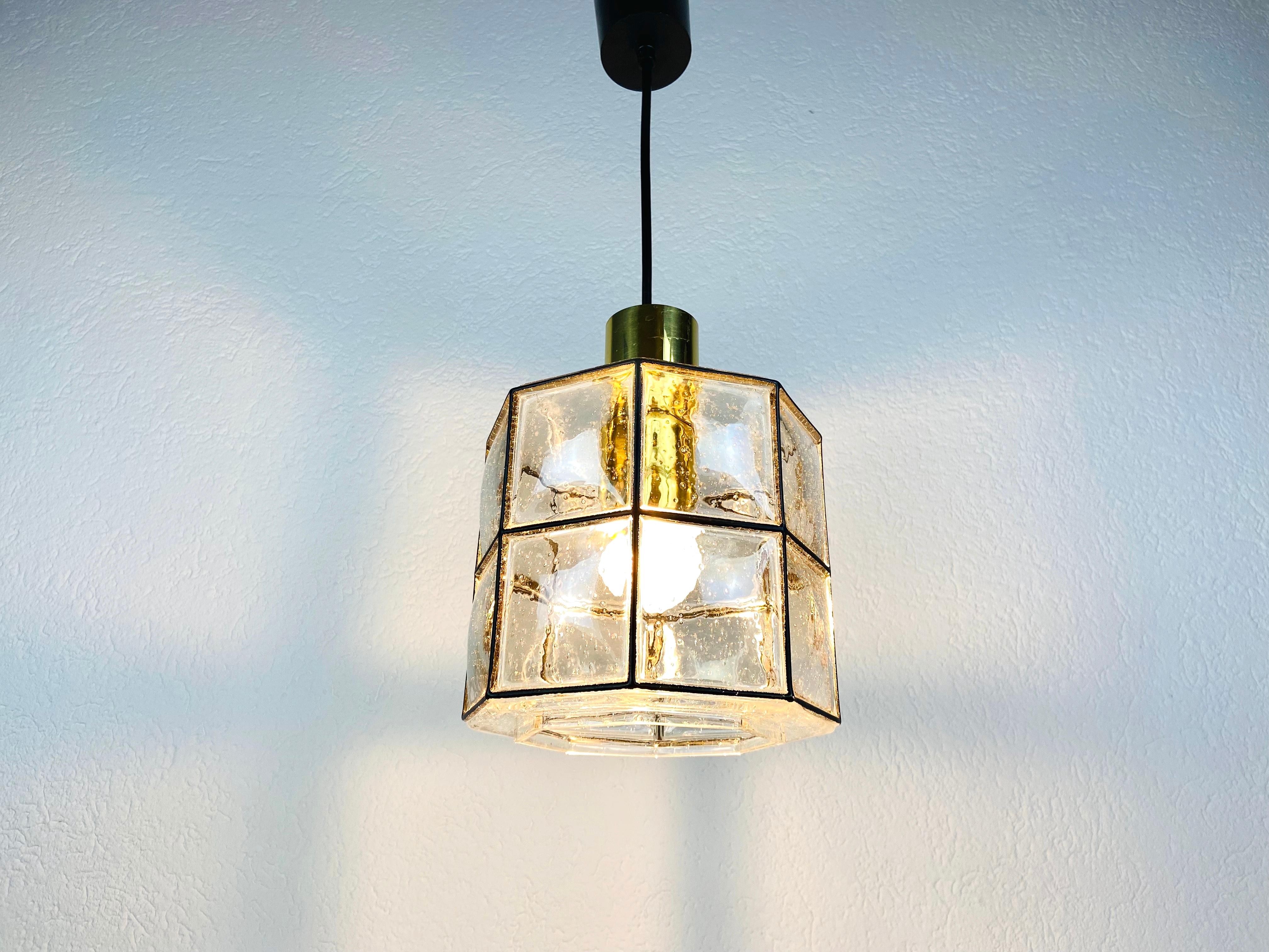 Midcentury Iron and Bubble Glass Pendant Lamp by Glashütte Limburg, 1960s In Good Condition For Sale In Hagenbach, DE