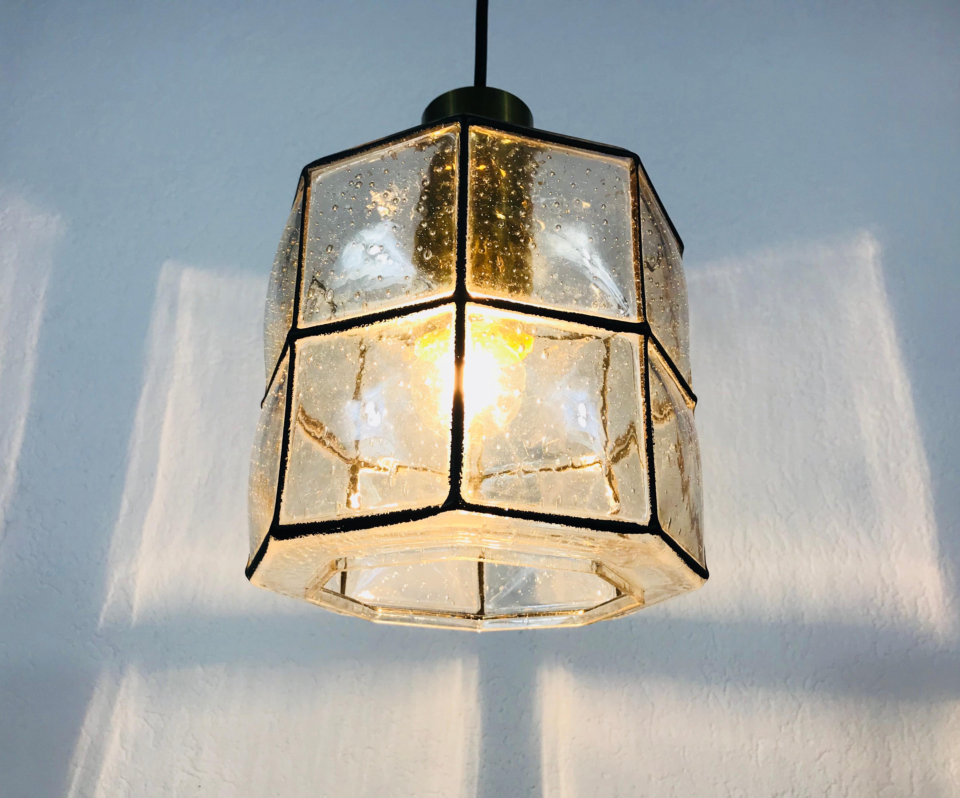 Mid-20th Century Midcentury Iron and Bubble Glass Pendant Lamp by Glashütte Limburg, 1960s For Sale