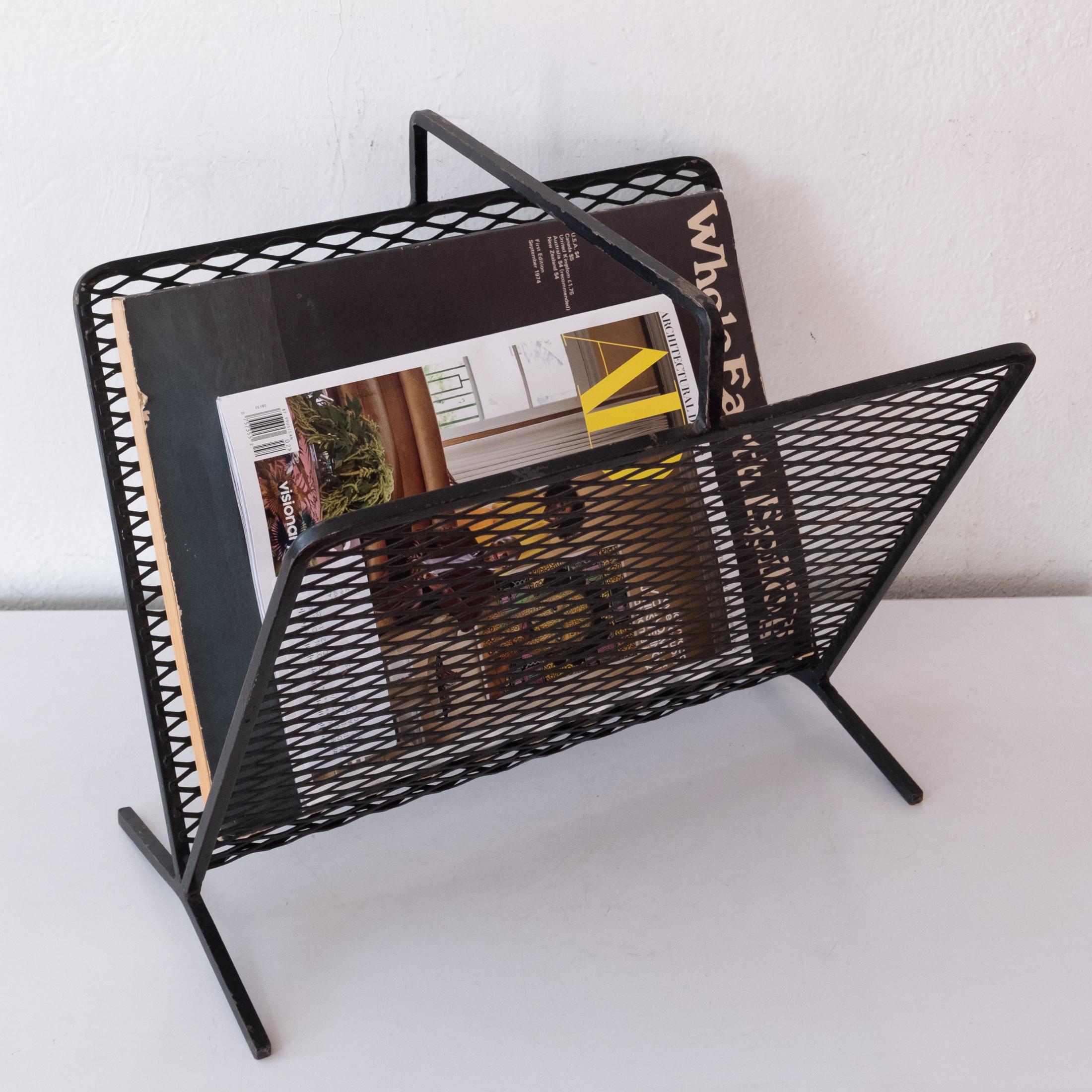 Iron and expanded metal magazine holder. Well done with a minimalist California design aesthetic. Original finish from the 1950s.
