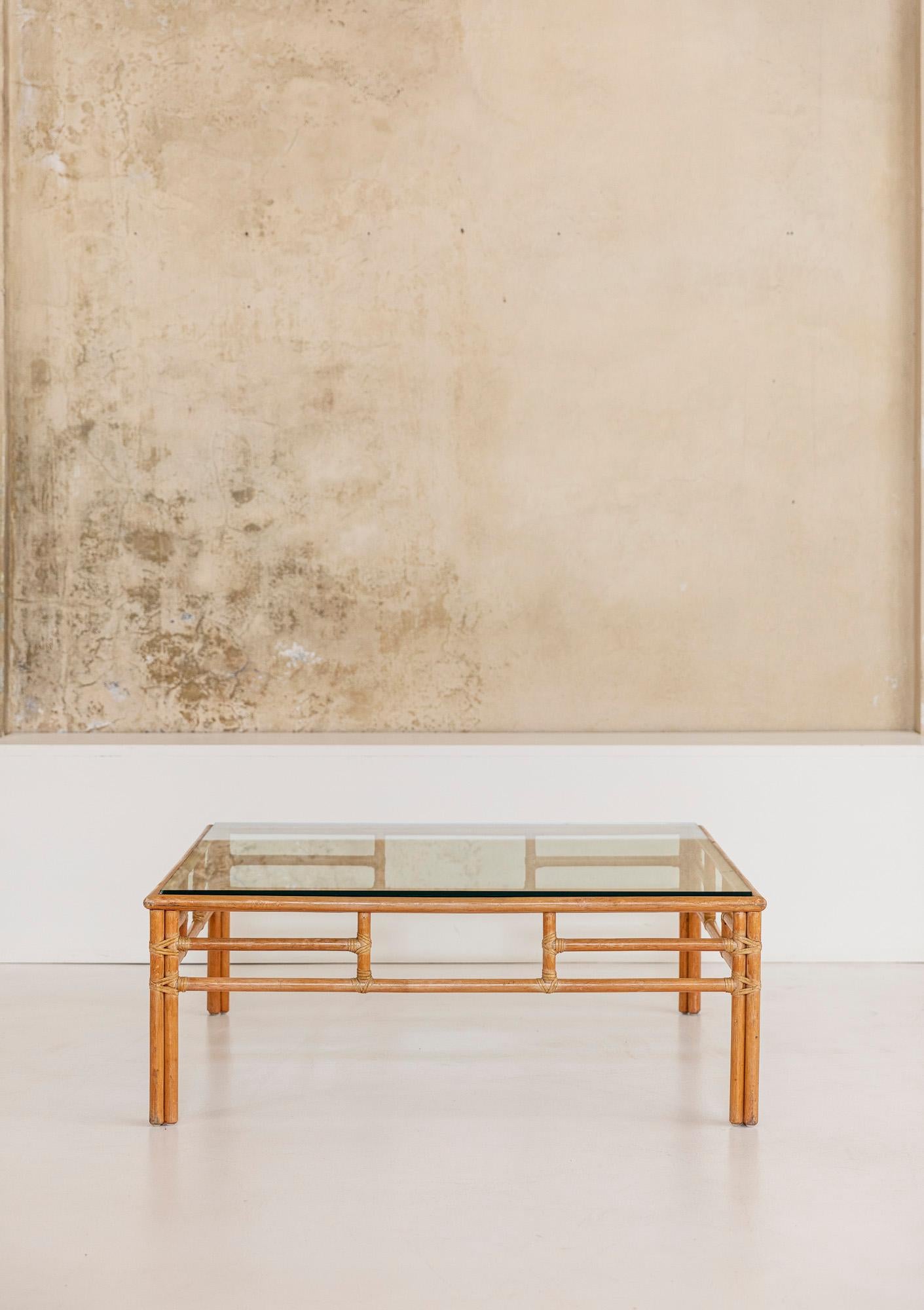 Stunning large coffee table made of bamboo with original glass top, this beautiful piece was designed by Lyda Levi in 1970 ca.
This table can be combined with the whole set including two sofas, two armchairs with their pouf, and two smaller tables.
