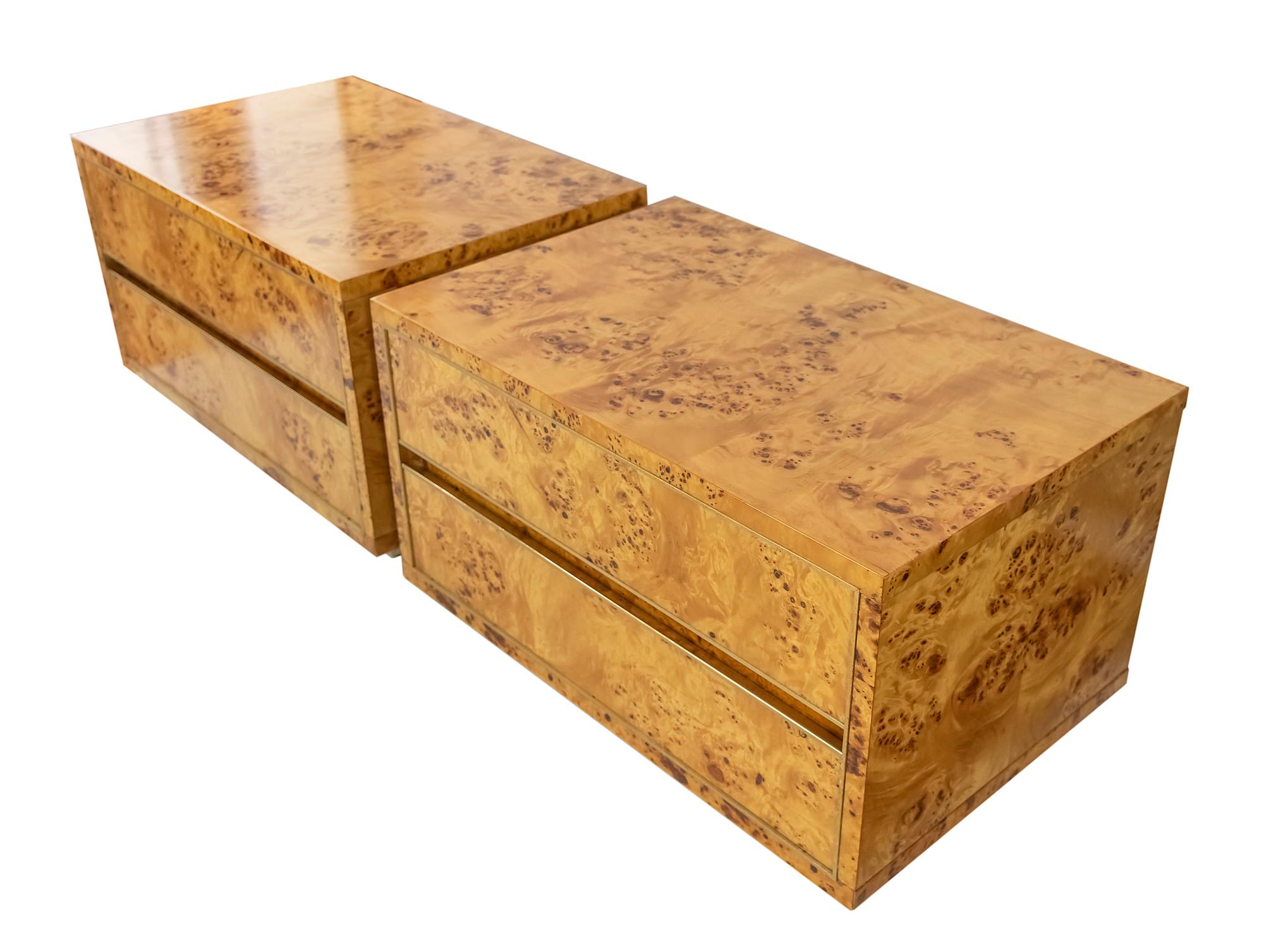 Pair of Italian vintage burl wood verneer bedside chests of drawers, tables, commodes by Willy Rizzo from 1970s.
Each includes two drawers with brass details as handles.
The face part of drawers framed with brass stripes as well pedestal plinth is
