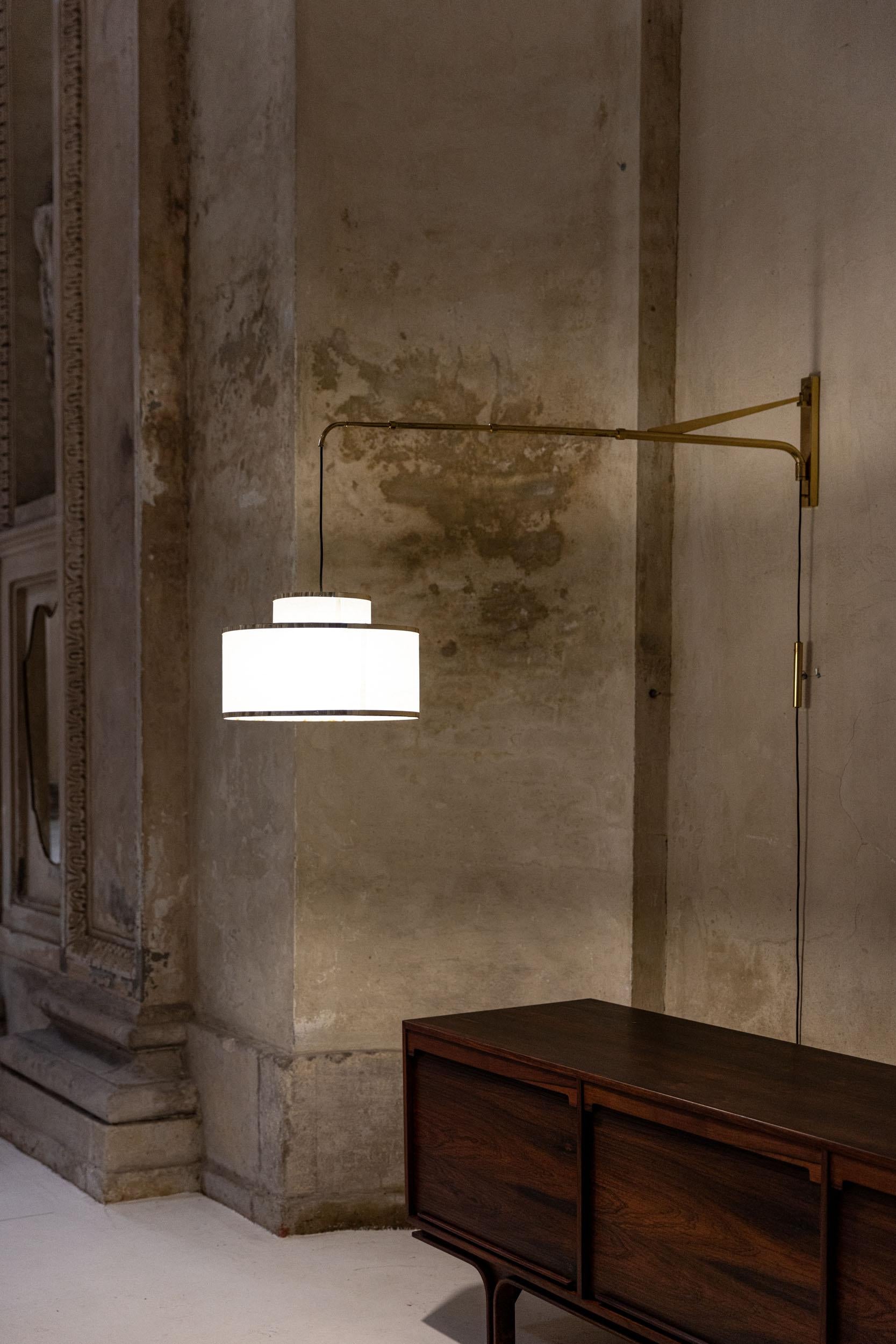 Mid-Century Modern Midcentury italian brass adjustable wall light For Sale