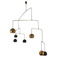 Midcentury Italian Brass and Black Large Mobile Chandeli "Magico e Meditativo"