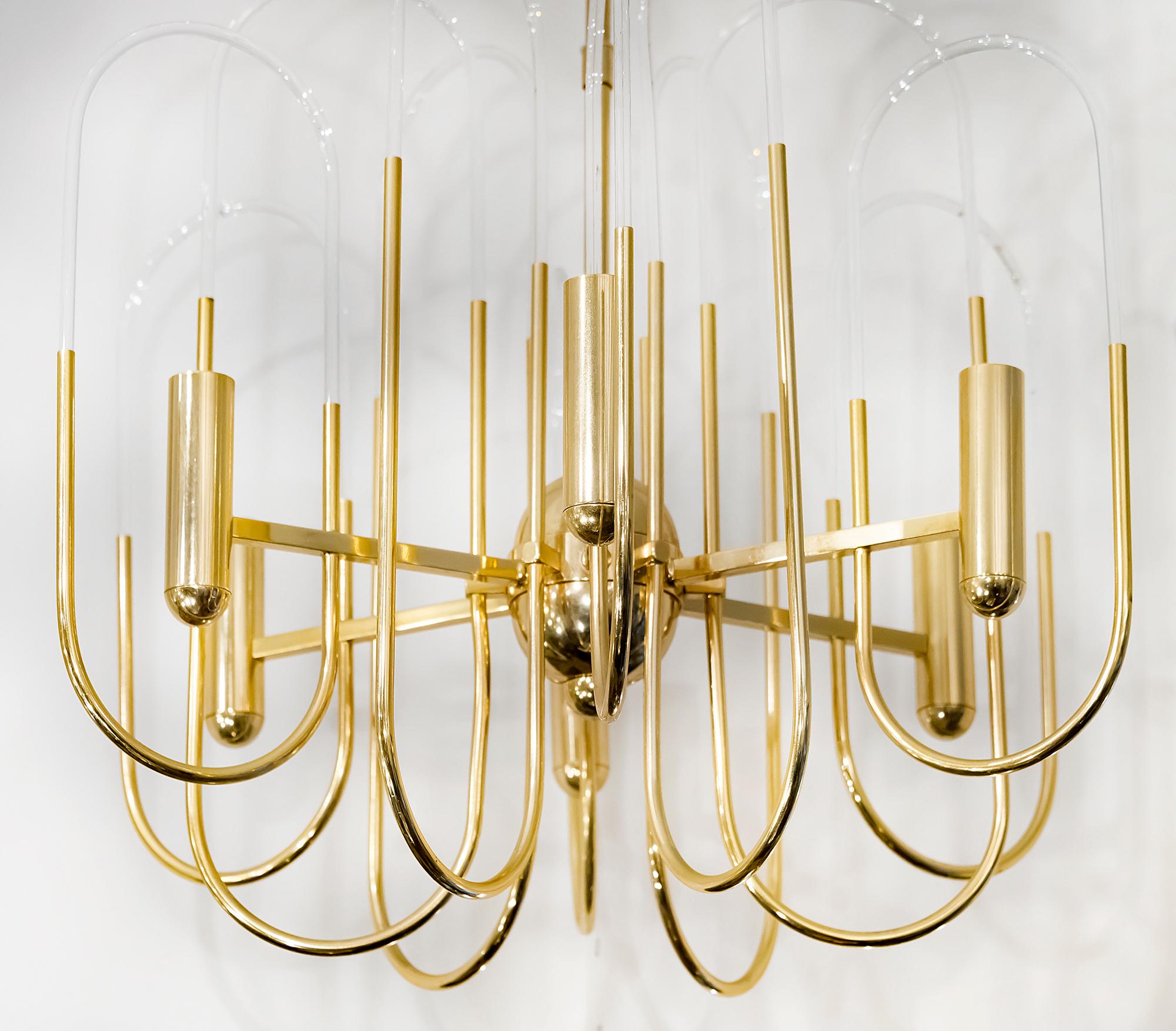 Italian midcentury chandelier is made of polished brass and clear glass in the holders. This chandelier includes 6 pieces. E14 bulbs. Its is in a very good original vintage condition.
 
    