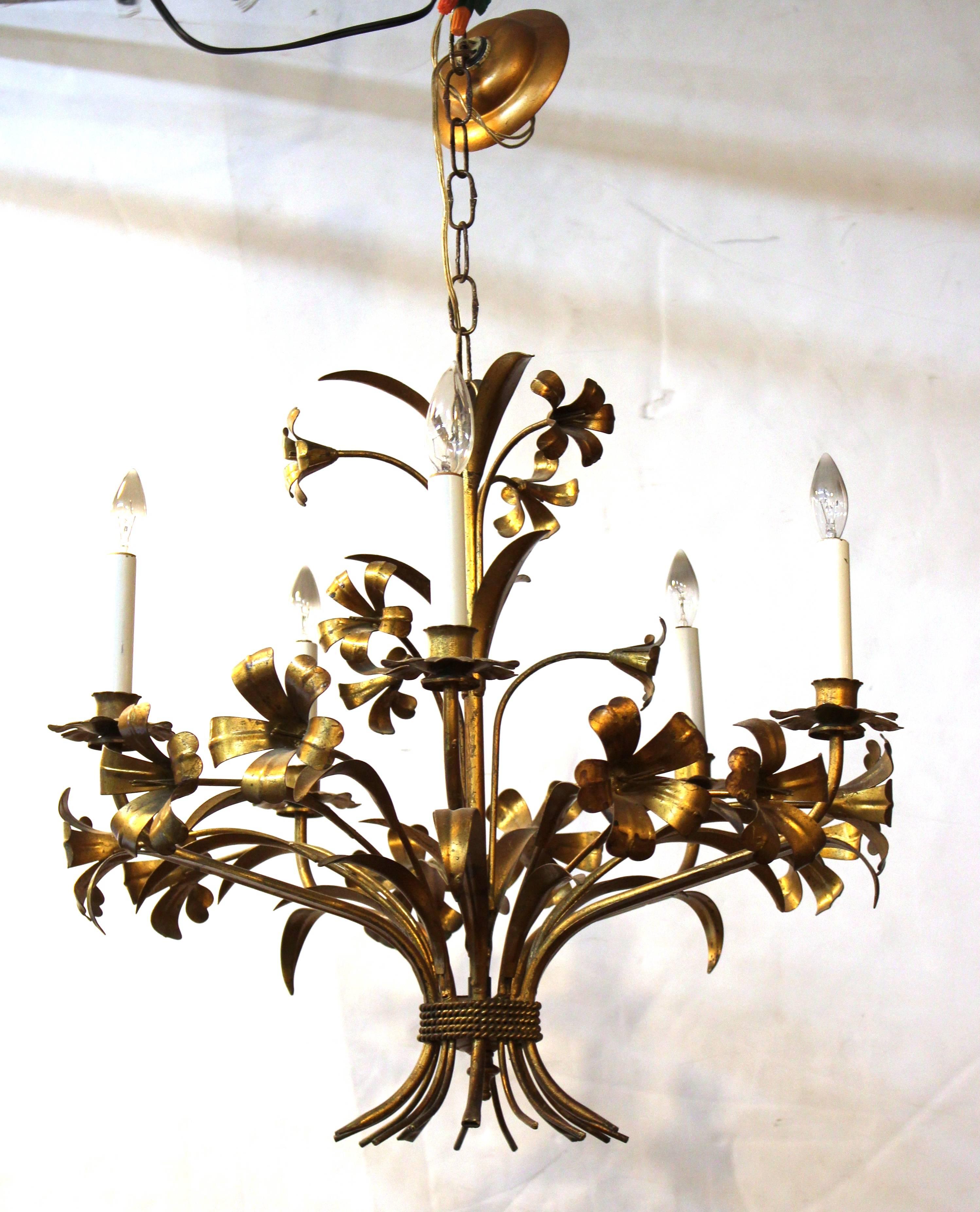 Mid-Century Modern Italian brass floral chandelier. The piece was made in Italy in the 1950s-1960s and is in good vintage condition.