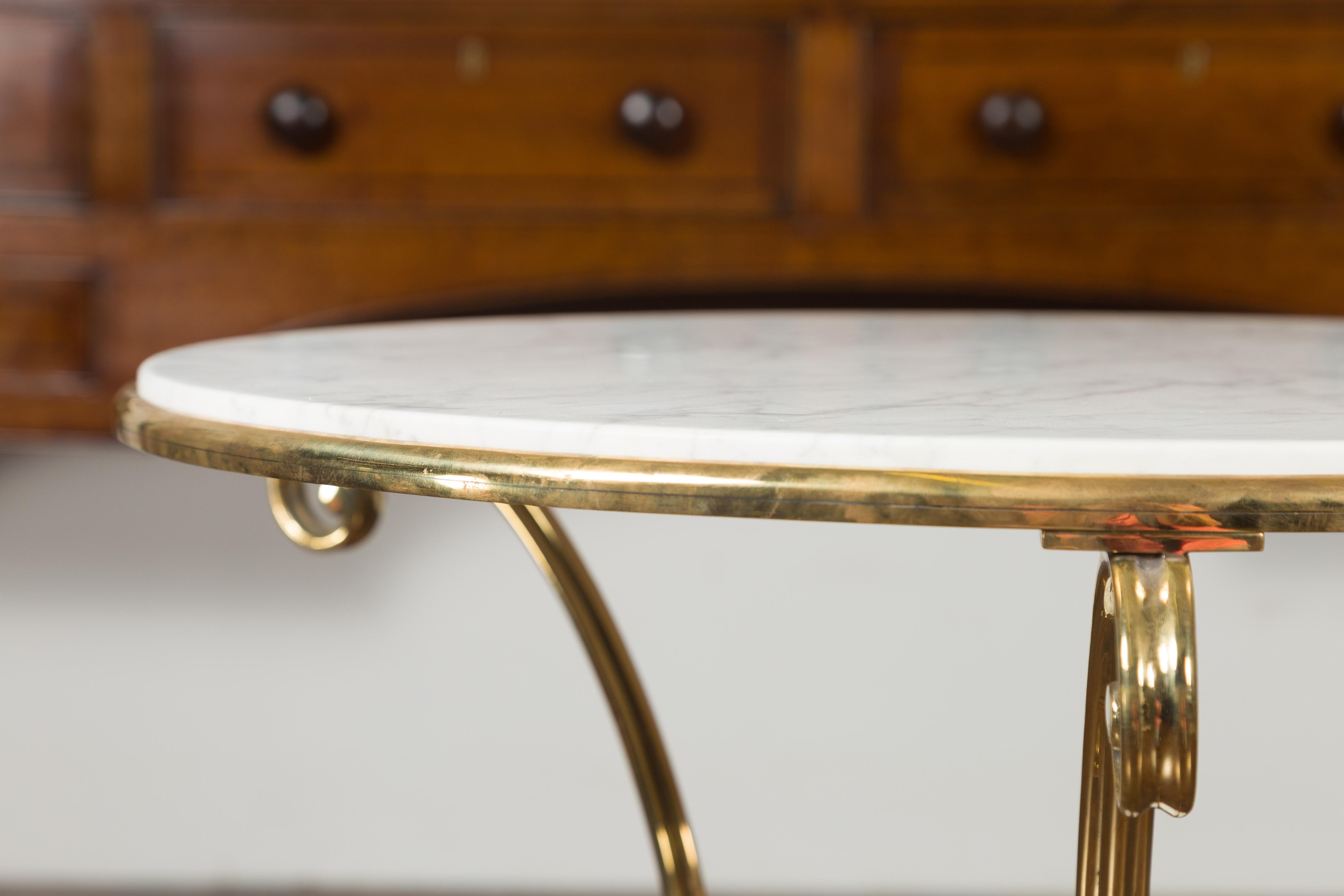 Midcentury Italian Brass Table with Round White Marble Top and Scrolling Legs In Good Condition In Atlanta, GA