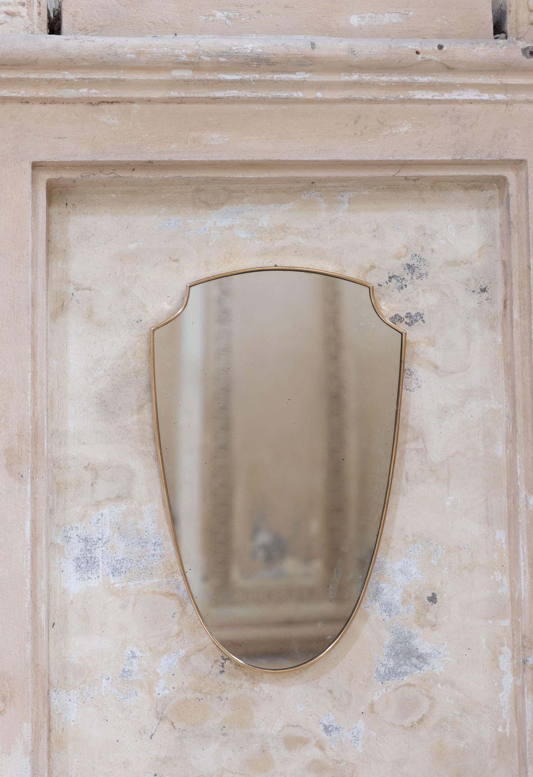 Mid-Century Modern Midcentury italian brass wall mirror in the style of Gio Ponti For Sale