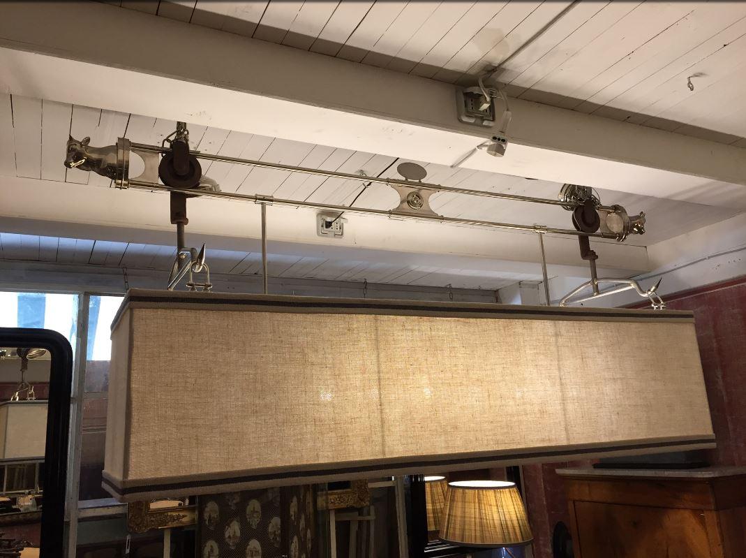Midcentury Italian nickel plated brass butcher hook assembled as a five bulbs chandelier with linen lampshade.
Measurements:
cm170 x 51 x total height cm 100/160
Lampshade height cm 42.
 