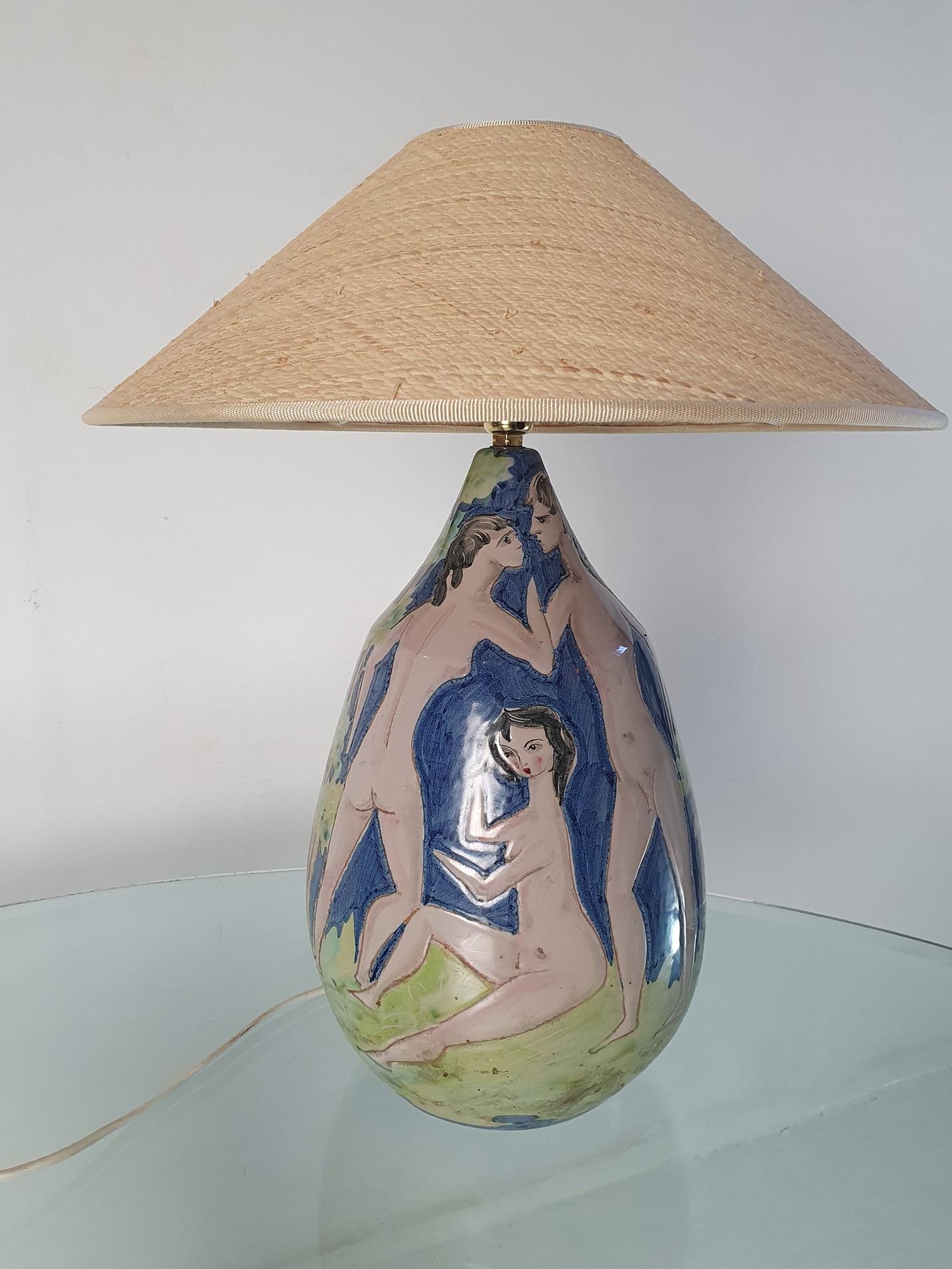 Adorn your living space with this one-of-a-kind Italian Studio Pottery Midcentury table lamp, lovingly handmade and hand-painted in the 1950s. The lamp is marked with a model number and the word 