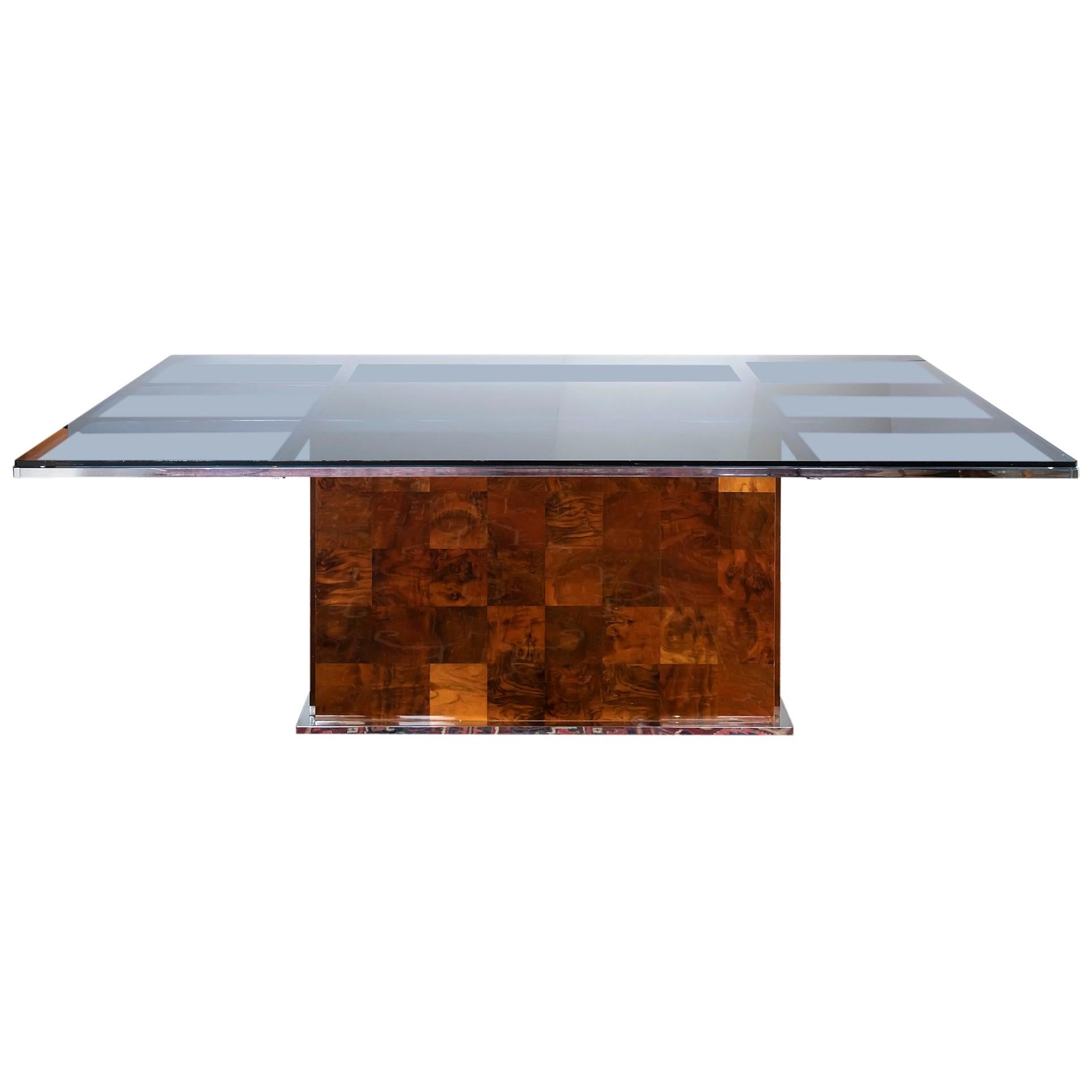 Midcentury Italian dining table by Willy Rizzo for Mario Sabot from 1970.
The base is very heavy and it is finished with lacquer burl veneer surface decorated with chrome element at the bottom.
The top frame construction in chrome with the thick