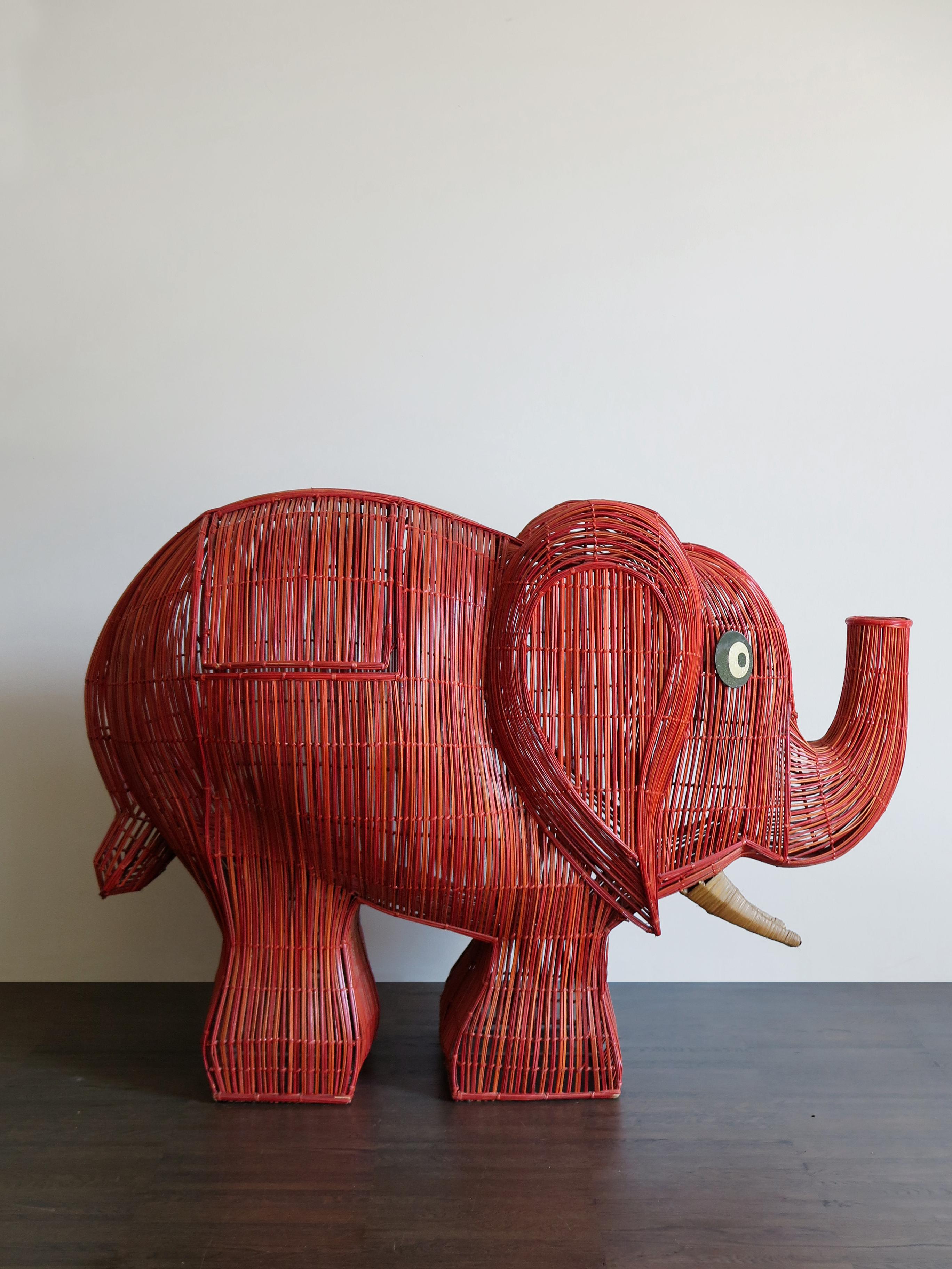 Italian midcentury wicker elephant / container with opening for possible insertion of objects, circa 1960s.
