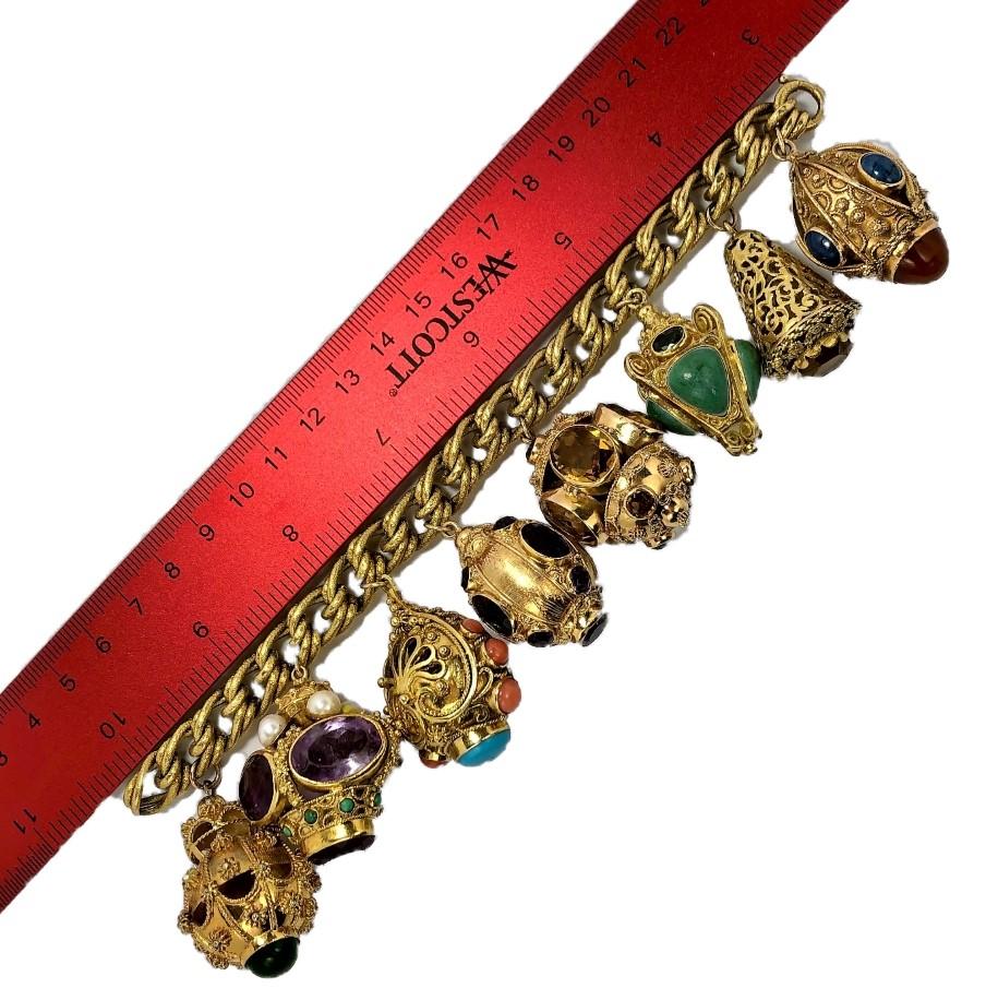 Midcentury Italian Gold Etruscan Revival Charm Bracelet -8 Assorted Color Charms In Good Condition For Sale In Palm Beach, FL