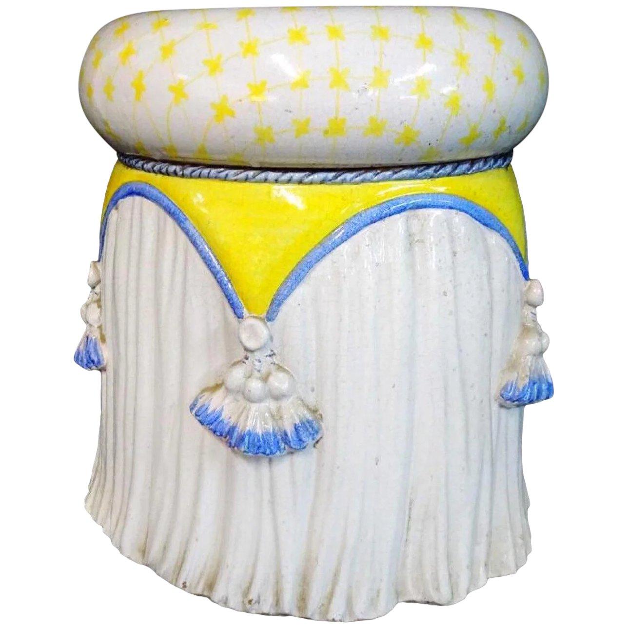 Stunning midcentury handcrafted and hand painted trompe l'oeil garden stool, with canary yellow and cerulean trellis and tassel design.