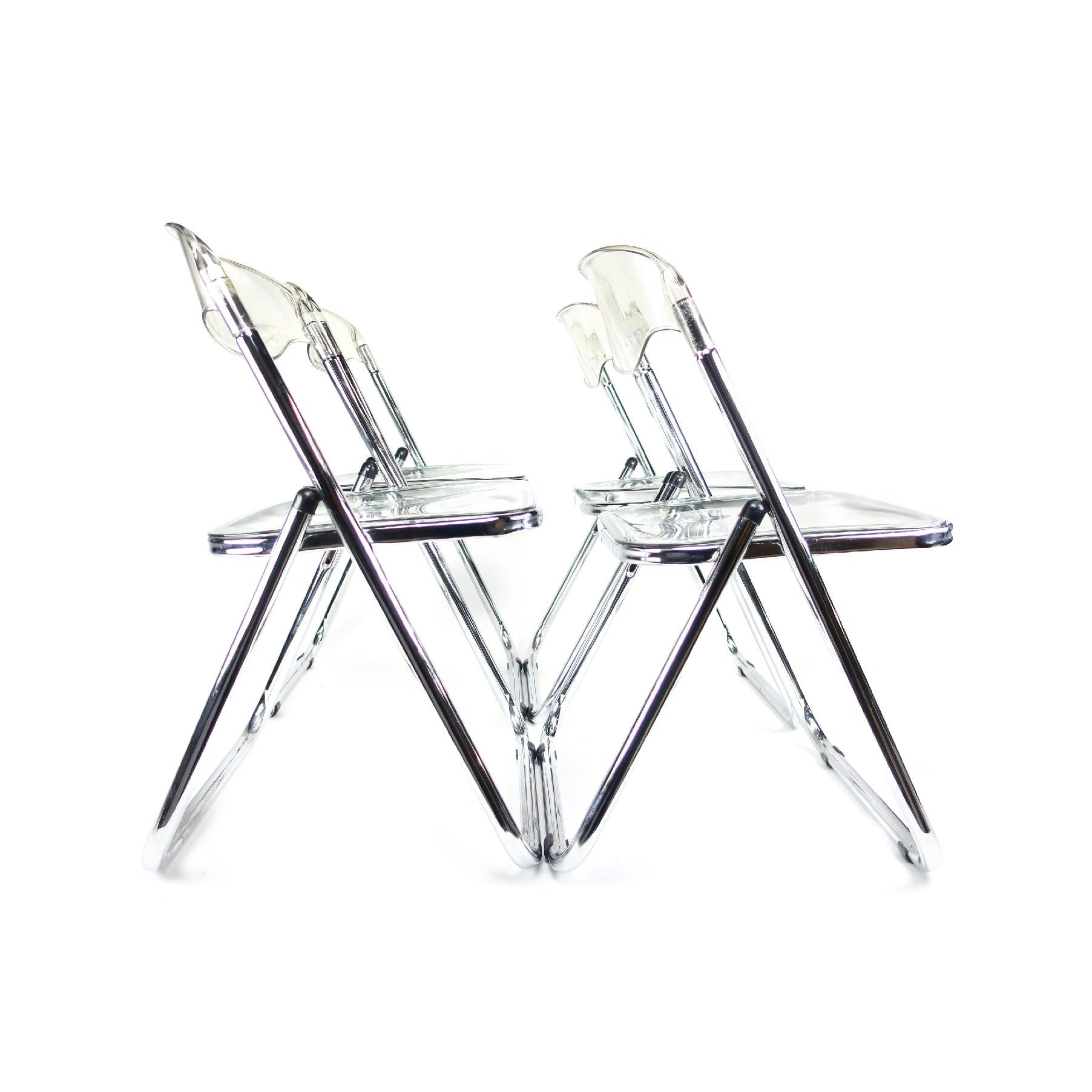 Midcentury Italian modern Lucite and chrome, set of 4

A very cool set of four Mid-Century Modern chrome and Lucite folding chairs in nice condition. No cracks or discoloration of the Lucite, with a minimum of age appropriate wear. Well cared for