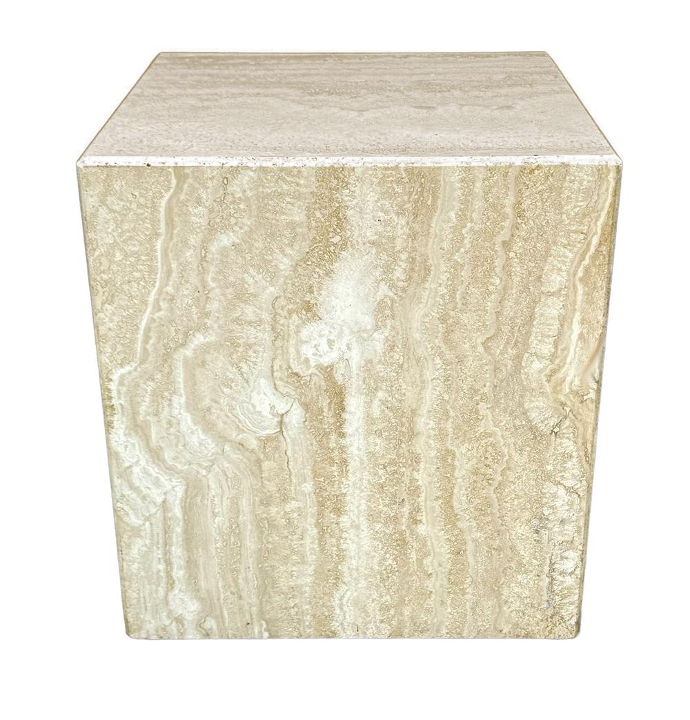 A simple and natural cube table made of travertine for Italy circa 1970s. It features solid slab travertine construction with beautiful veining and marks.