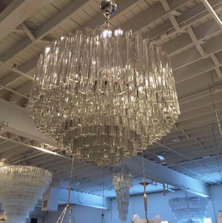 Stunning Mid-Century Modern Italian round chandelier. Each of the prisms are solid glass, measuring 11 and 4 inches. They hang from hooks on a nickel frame, as pictured. Any amount of chain or rod can be added for custom hanging length of the