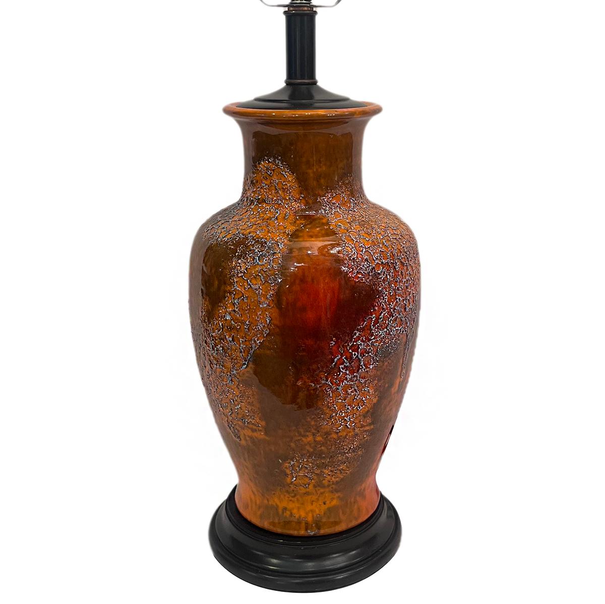 A circa 1960's Italian porcelain lamp.

Measurements:
Height of body: 15.75