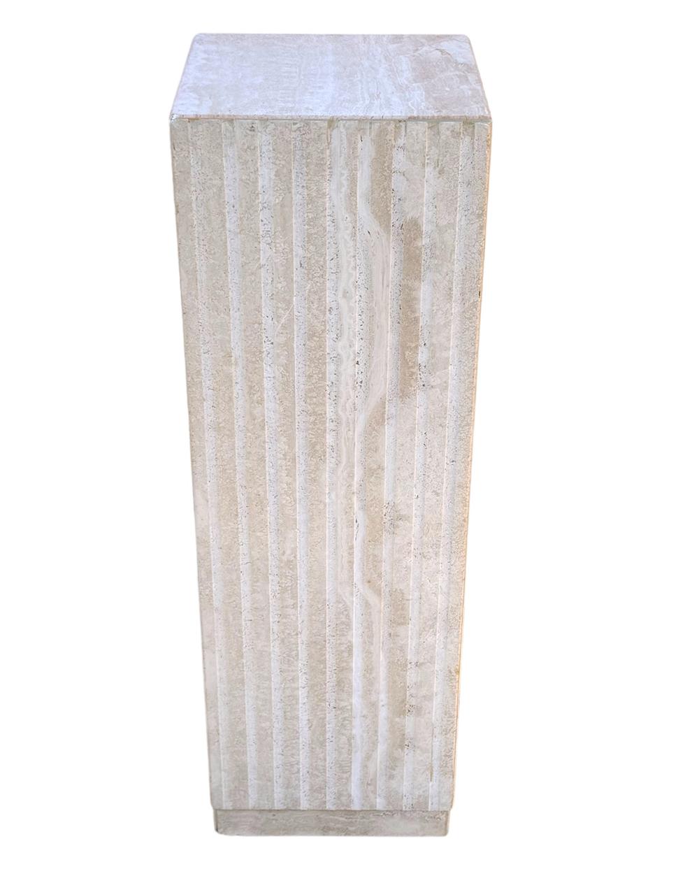 A sleek looking pedestal from Italy, circa 1980s. It consists of thick solid travertine slab construction. Very good condition.
