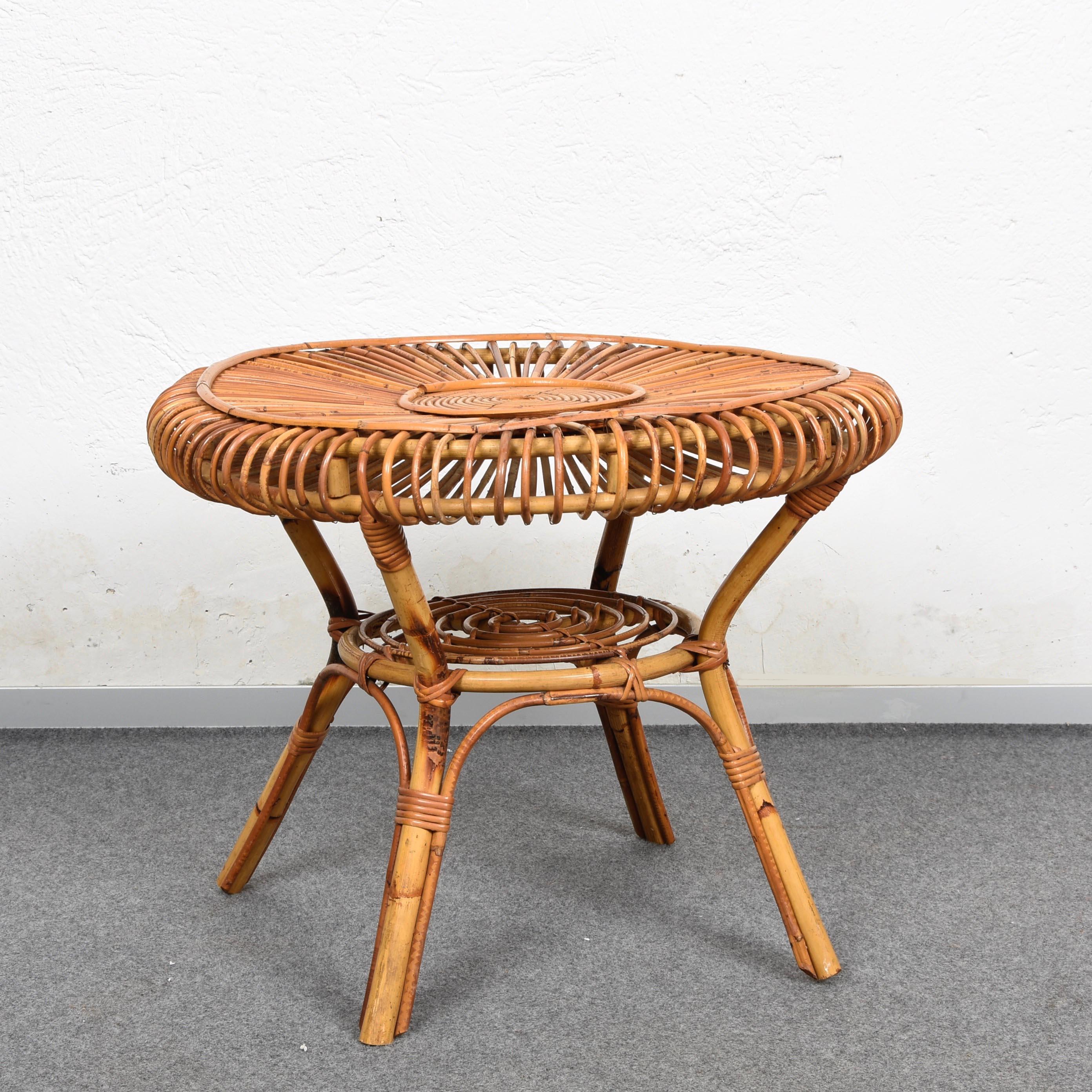 Amazing midcentury round rattan and bamboo coffee table.

This wonderful bamboo and rattan coffee table was produced in Italy during the 1960s.

This item is very useful and adaptable due to its design and its solid structure in bamboo will