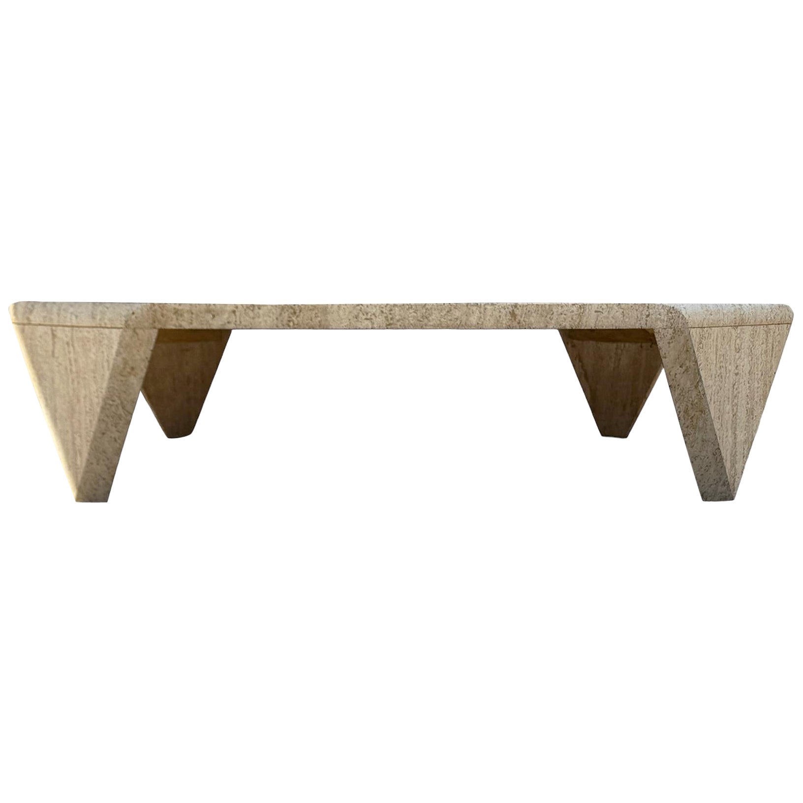 A simple and sculptural square coffee table made of travertine for Italy circa 1970s. It features a very low profile with solid slab travertine construction with beautiful veining and marks. 