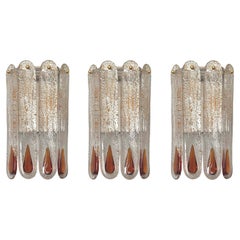 Midcentury Italian Set of Three Amber Murano Wall Sconces by Mazzega, 1970s