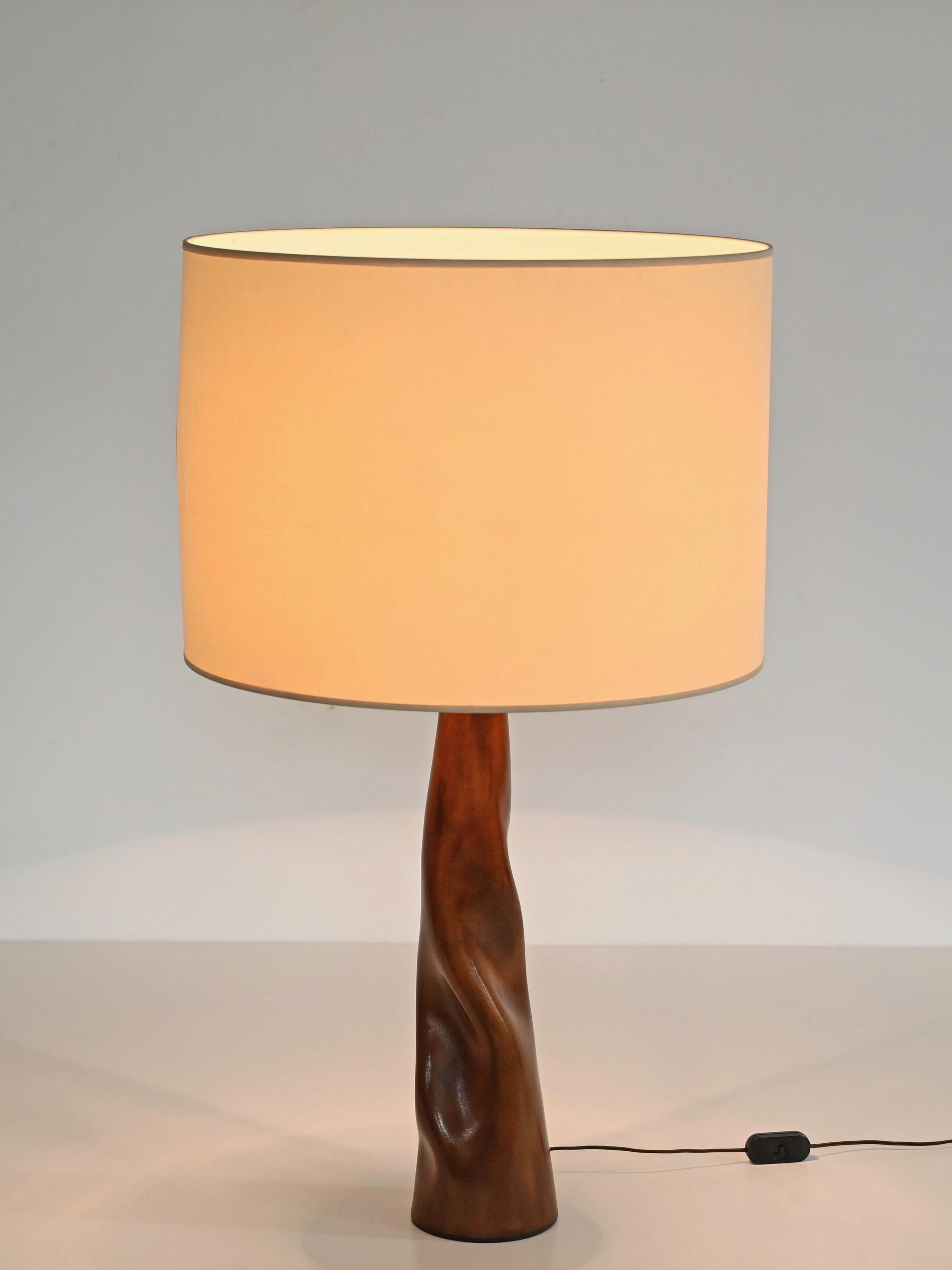 Magnificent sculptural table lamp in curved full grain Italian brown leather. This incredibly stylish and unique piece was produced in Italy during the 1970s and is stamped on the bottom.

In amazing condition and with a charming natural patina