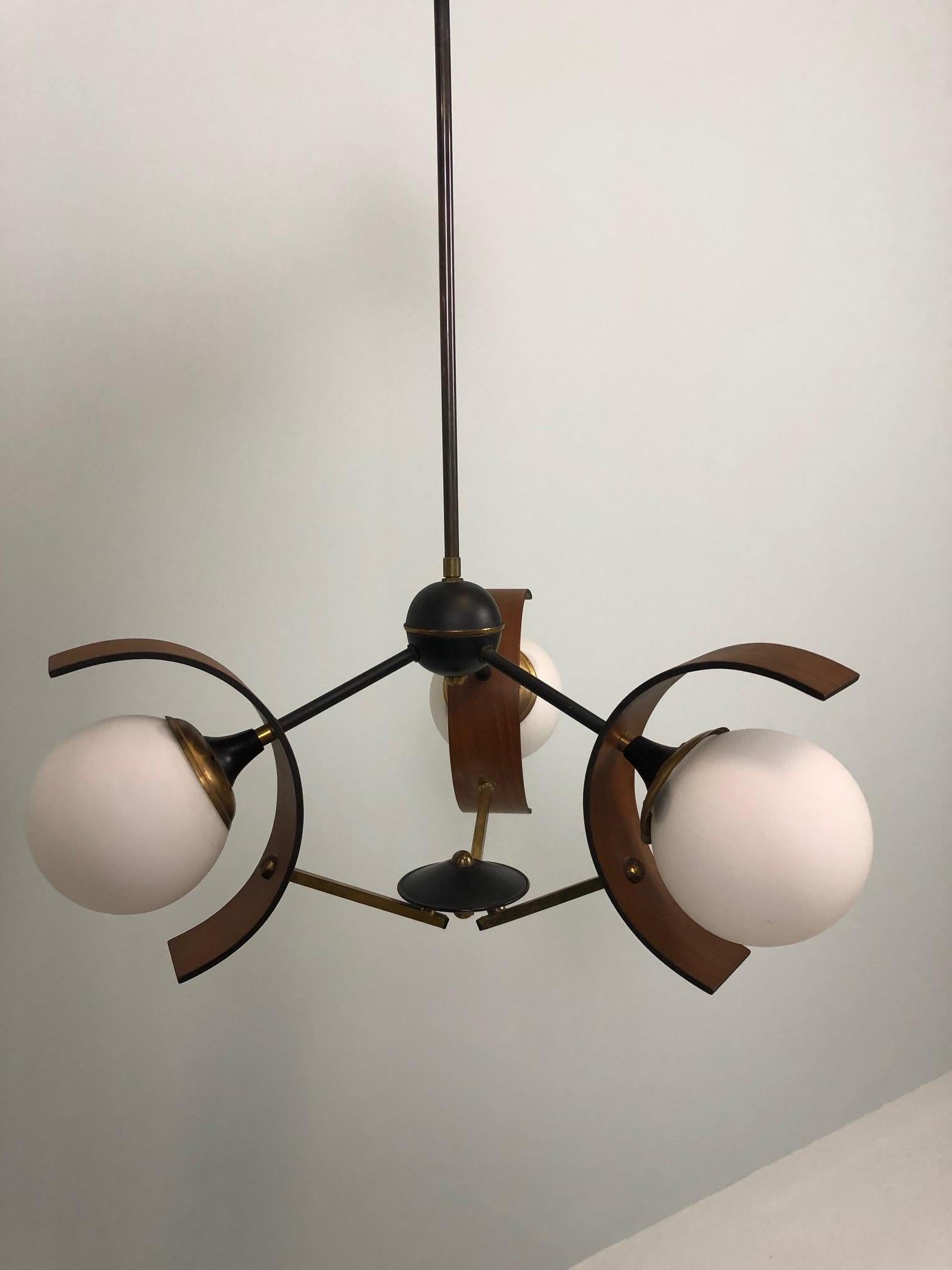 3-flame lamp from the 1960s, Italy, chandelier, teak, brass and glass.