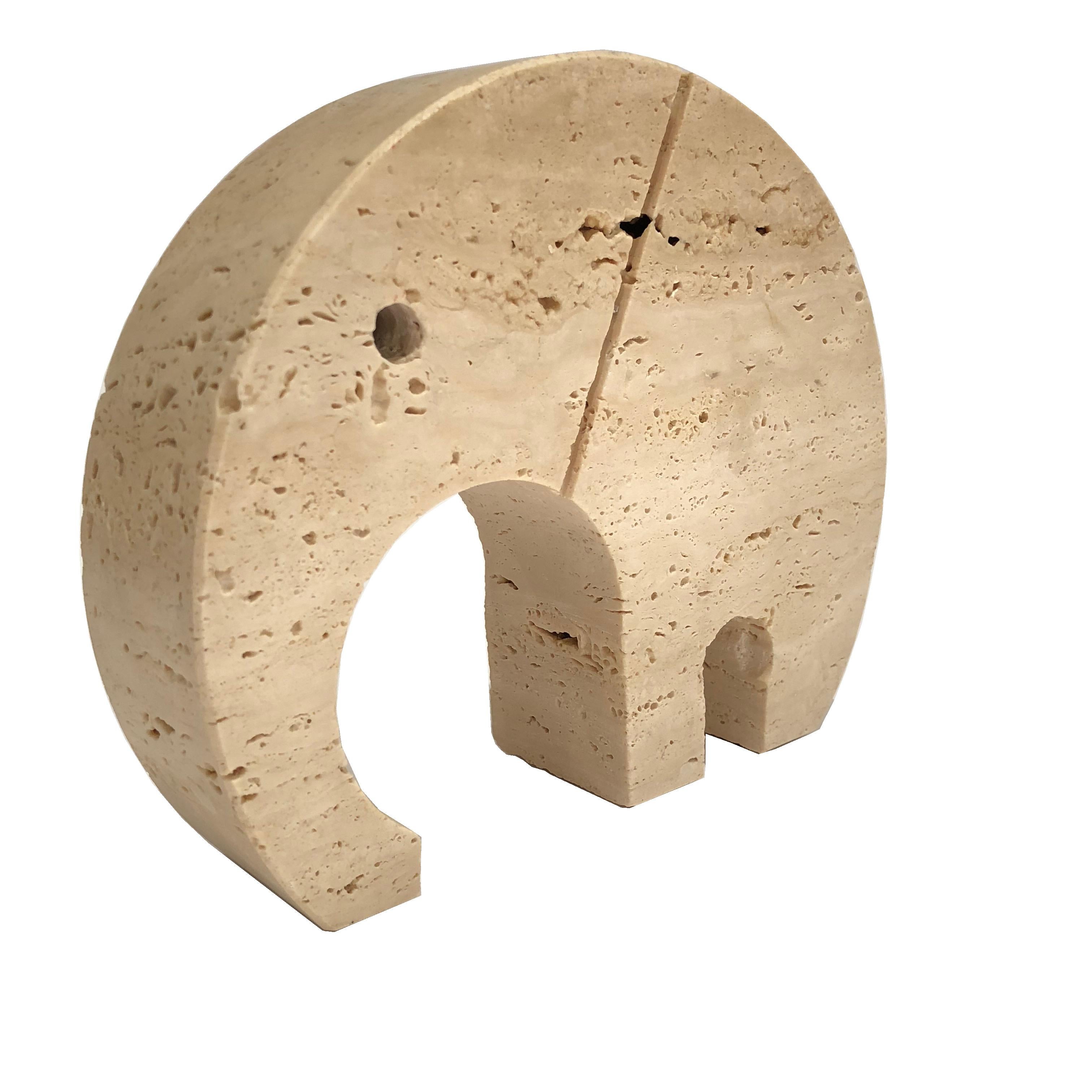 This midcentury travertine stone paperweight of a good luck elephant is by the designer Fratelli Manelli who worked the travertine. Great for a desk accessory or hallway entry.