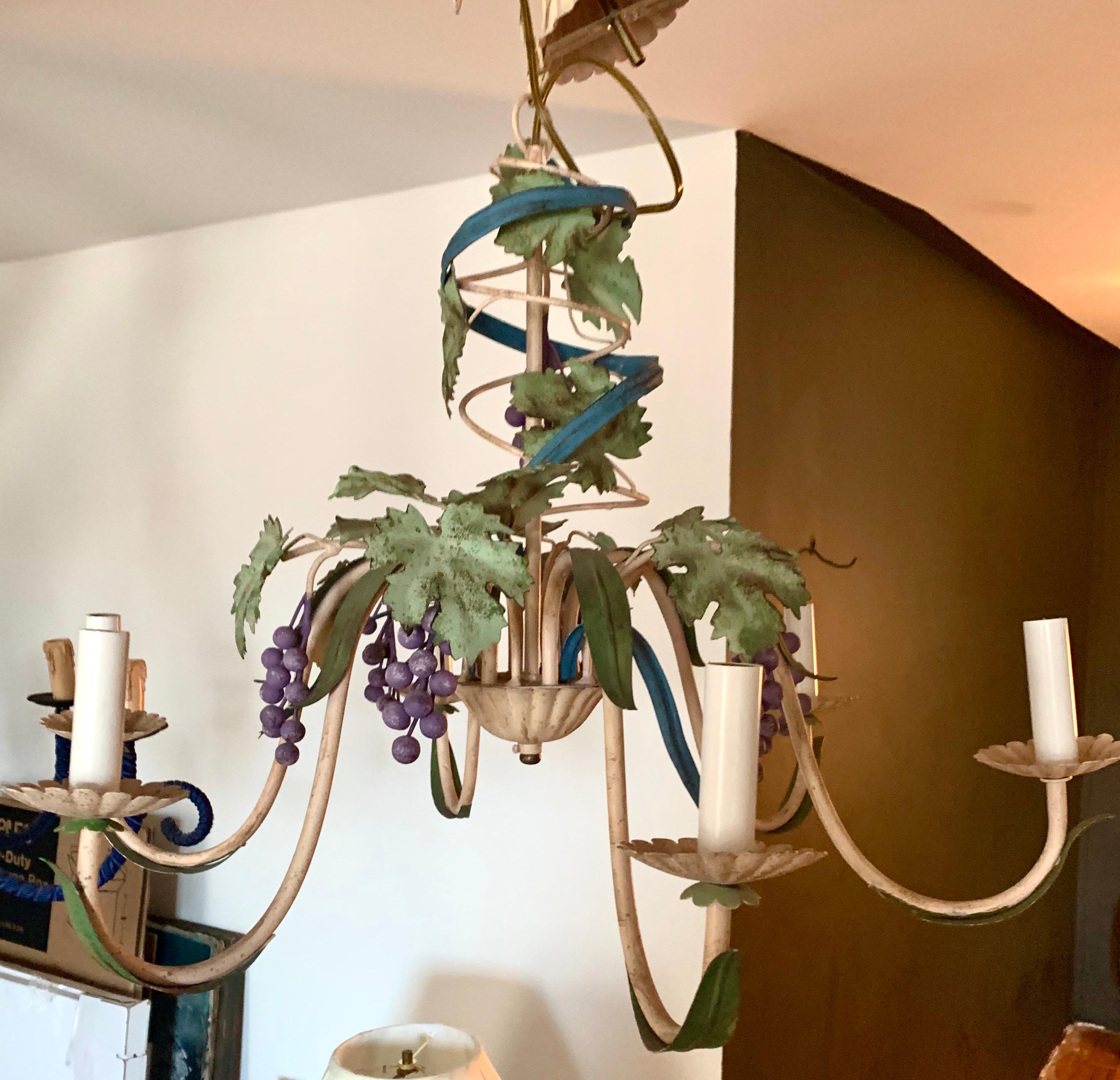 Midcentury Italianate Tuscan Toleware grapevine six-arm chandelier, rustic chic. Gorgeous patina. Retains much of its original pigment. Swirling blue ribbon around central axis is an amazing feature.