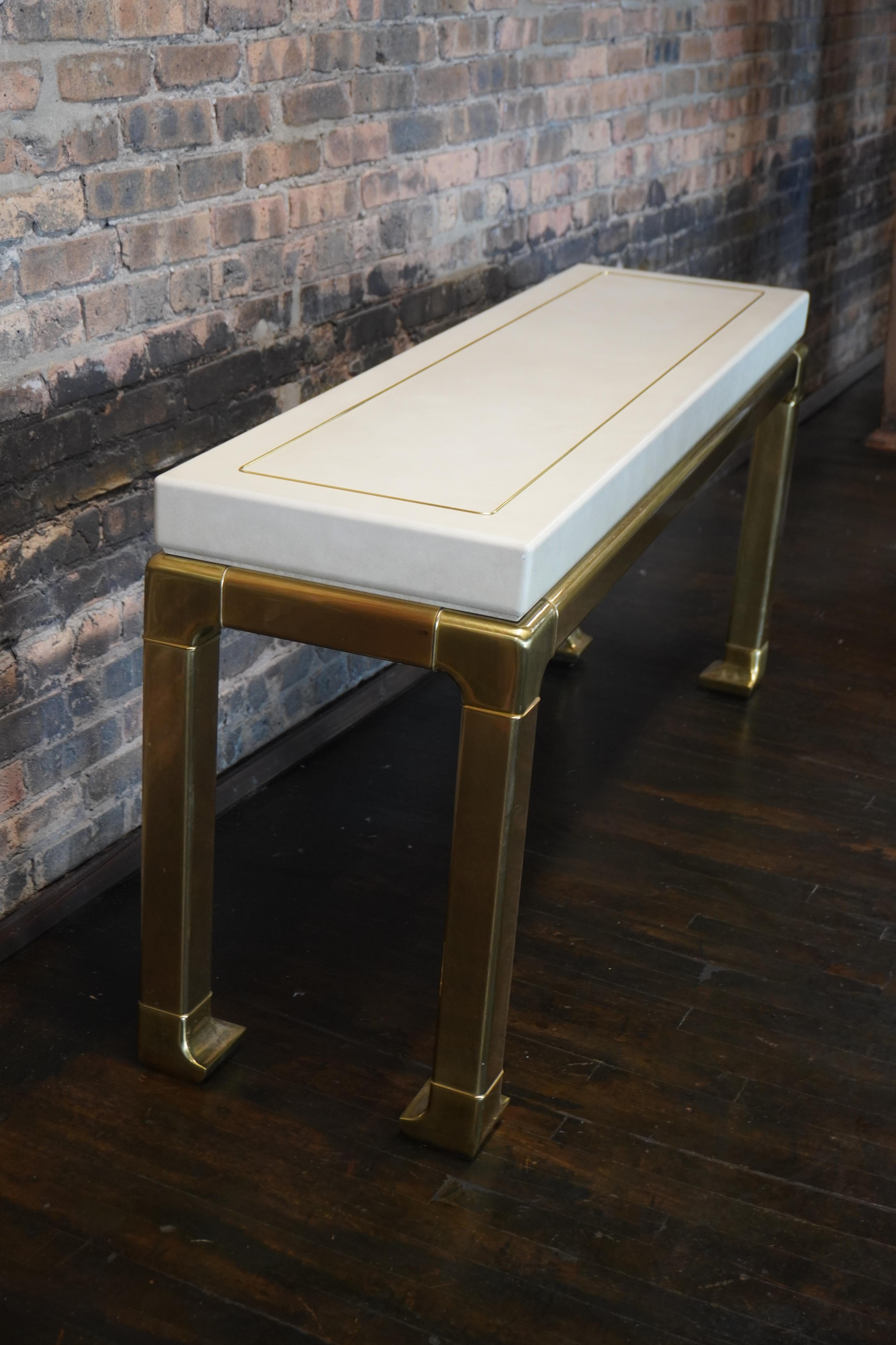 American Mid-Century Ivory Console Table on Brass Legs Attributed to Mastercraft For Sale