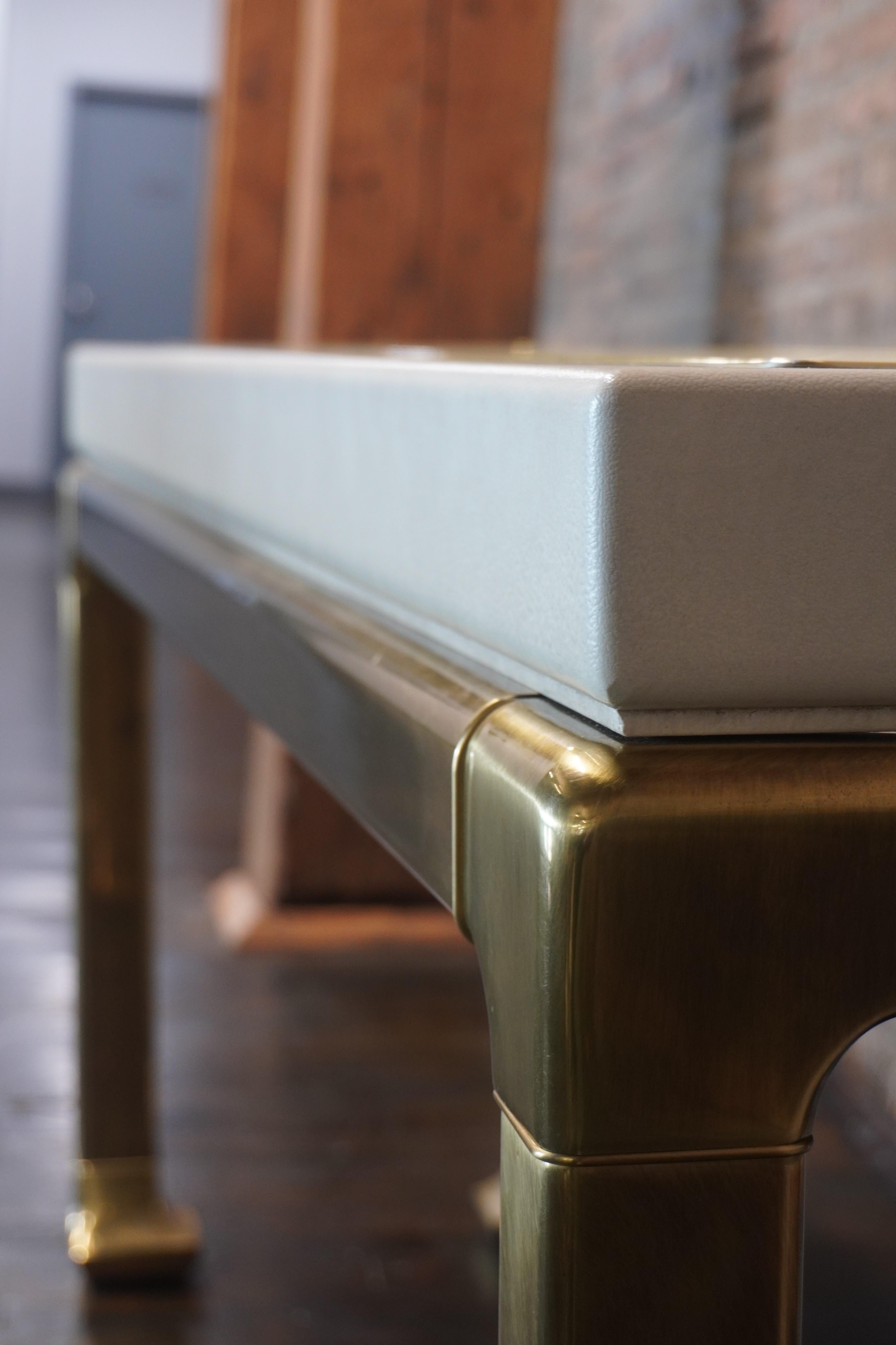 Mid-Century Ivory Console Table on Brass Legs Attributed to Mastercraft For Sale 1
