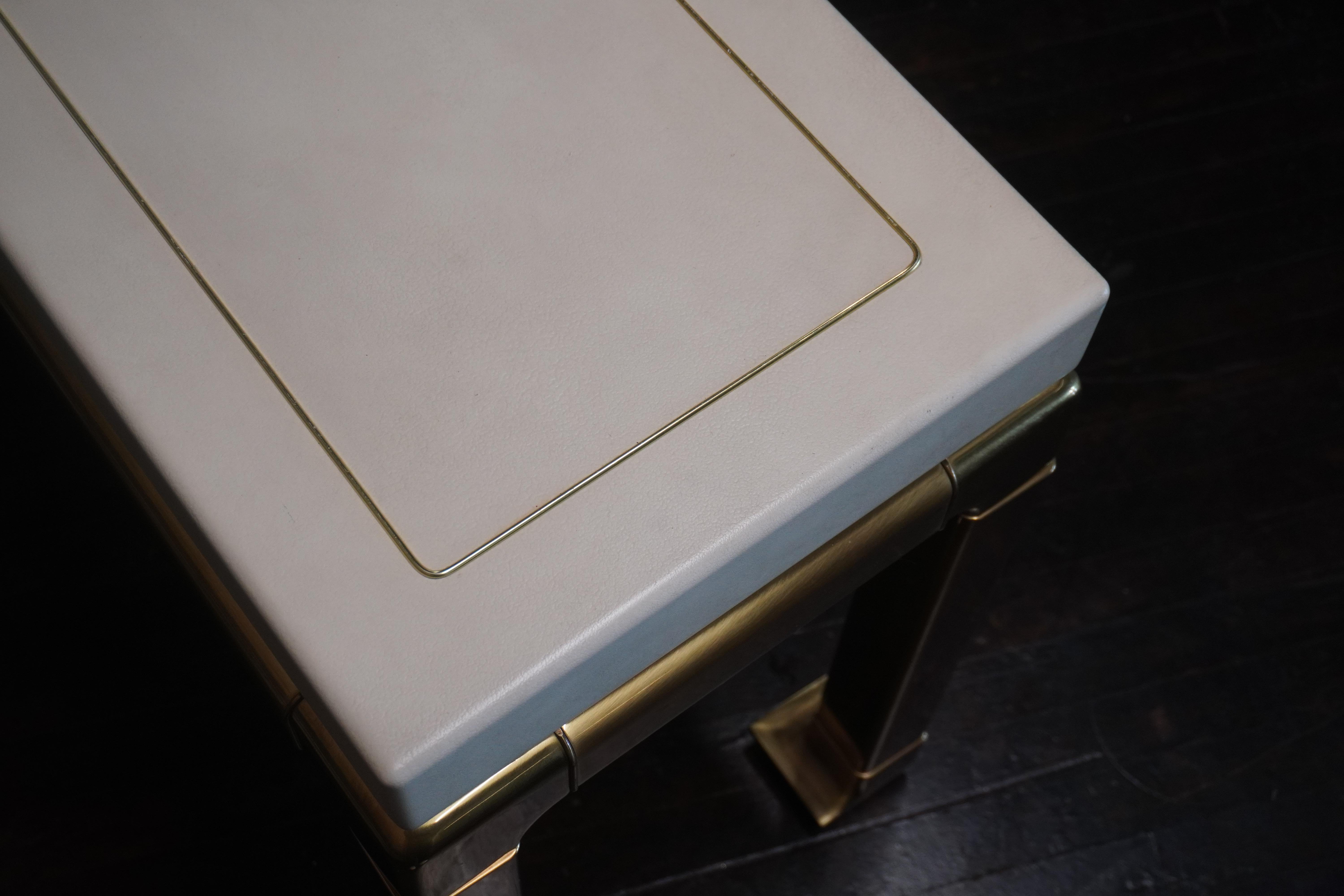 Mid-Century Ivory Console Table on Brass Legs Attributed to Mastercraft For Sale 3