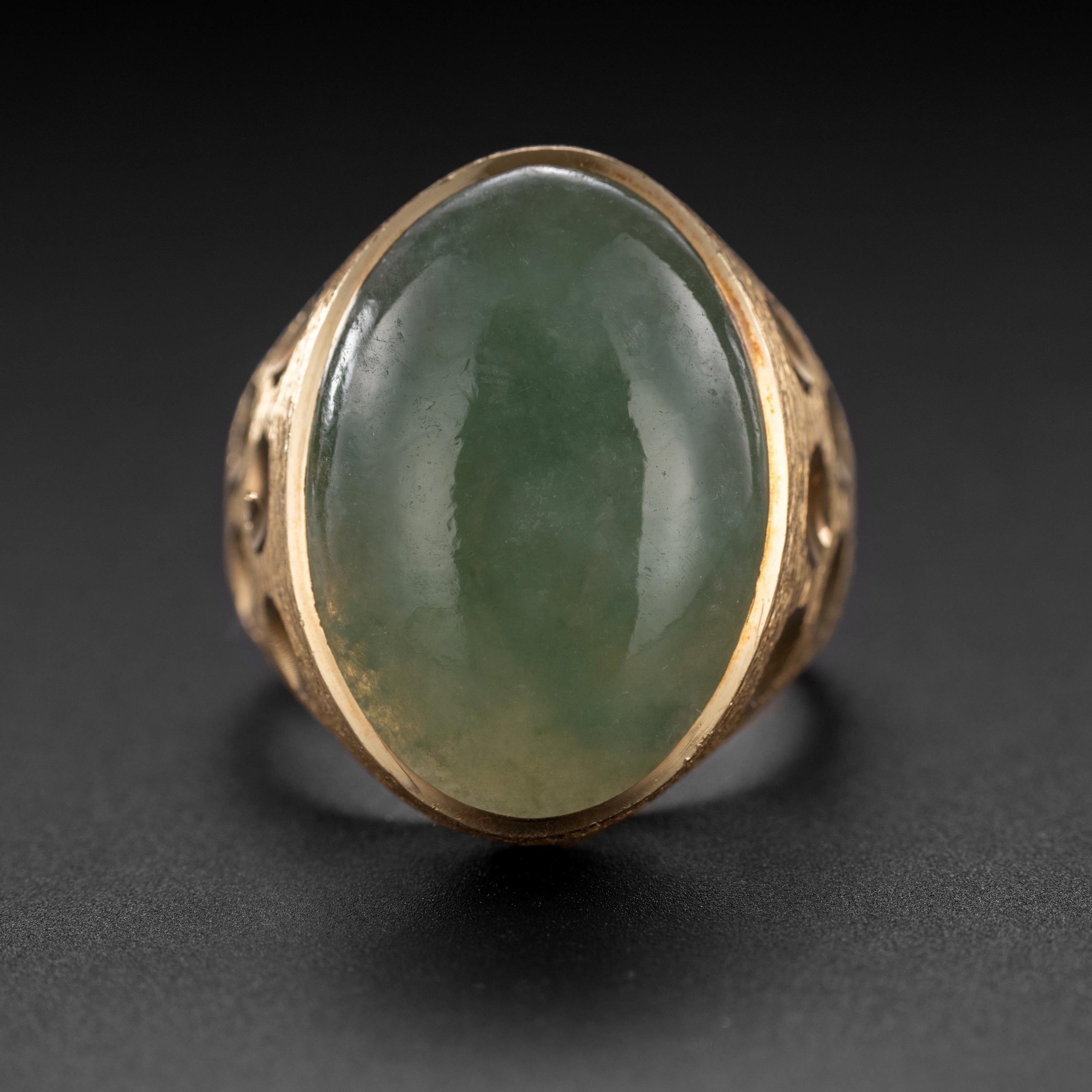 This is one substantial -and substantially cool- jadeite jade ring from the middle of the last century (circa 1960s). Mod and modern, natural and untreated Burmese jadeite ring is incredibly impressive. It's a ring that looks like it would be