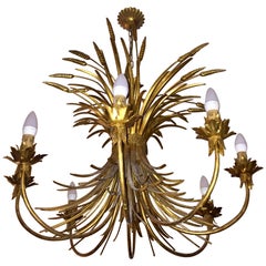 Lustre à huit lumières en feuilles dorées de style Jansen français du milieu du siècle dernier