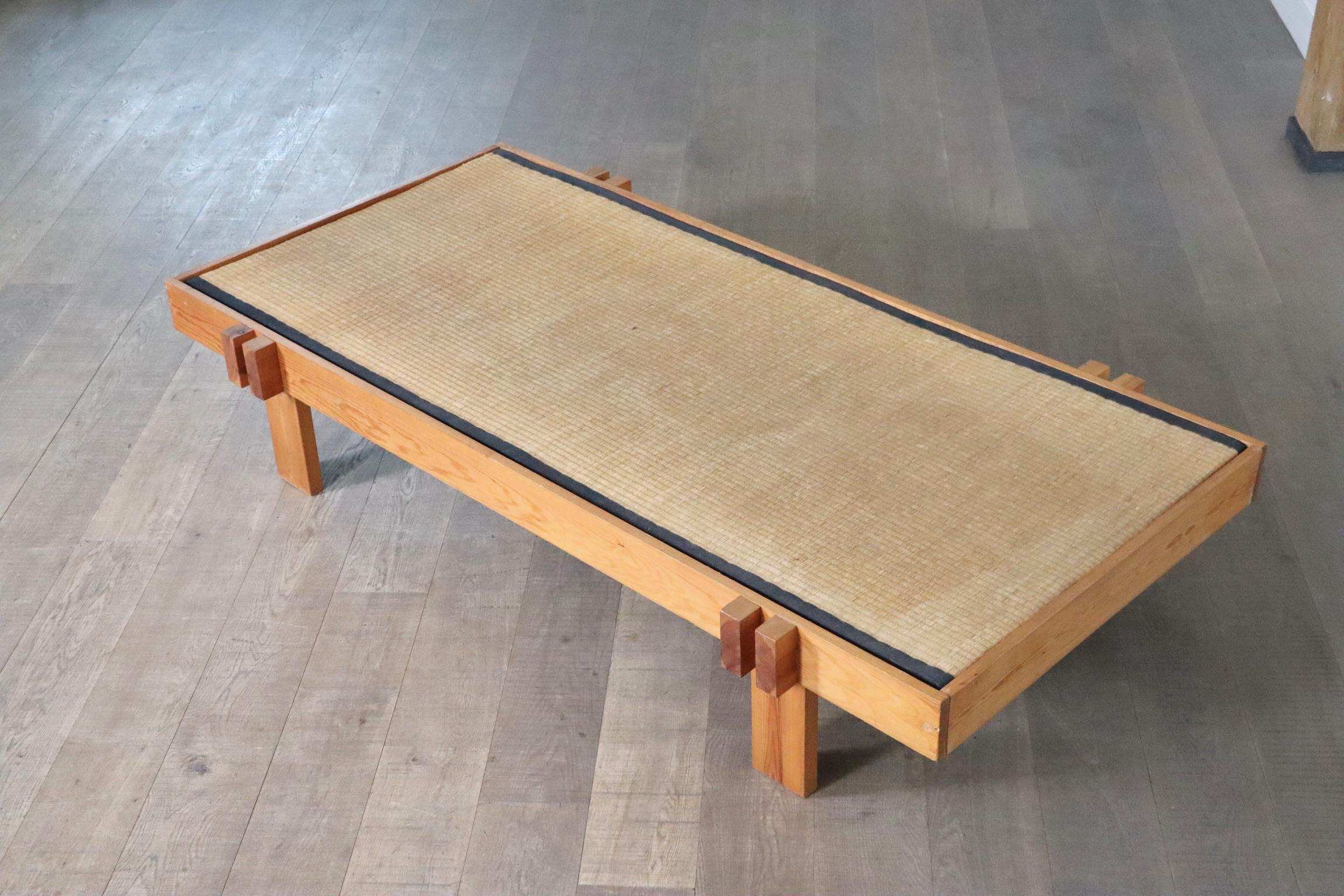 Beautiful Japanese coffee table made of wood and seagrass, Japan 1960s. A nice example of a minimalistic coffee table which brings harmony in a busy life. A nice large table top made of a thick seagrass inlay resting in the wooden frame. With the