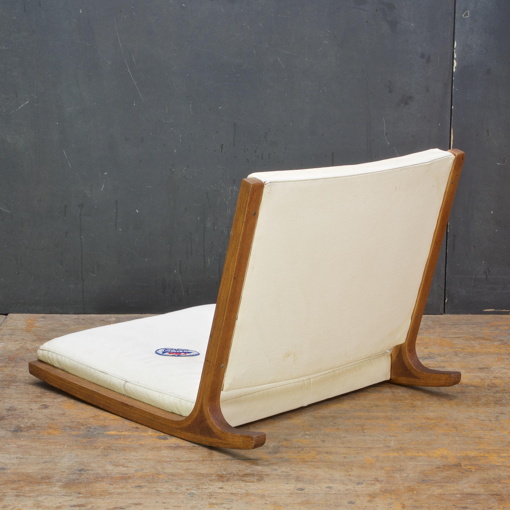 JAPAN, c.1960s. 
Kenzo Tarumi for Tendo Mokko. A rare baseless wooden rocking chair, very much in the manner of Junzo Sakakura (Japanese, 1901–1969). Bent and laminated beech wood, and upholstery is a textured white vinyl. Very similar construction