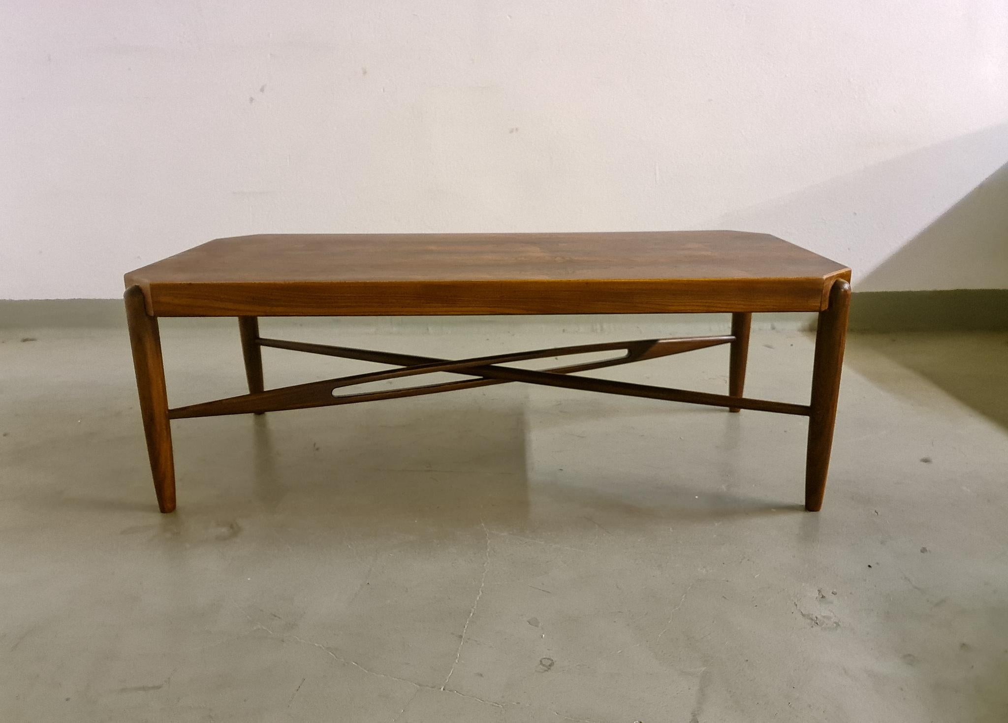 Rare Mid-Century Modern Danish modern Jason Ringsted rosewood and teak coffee table. 

The top of the table is in very good condition. The legs have wear and in vintage condition.
