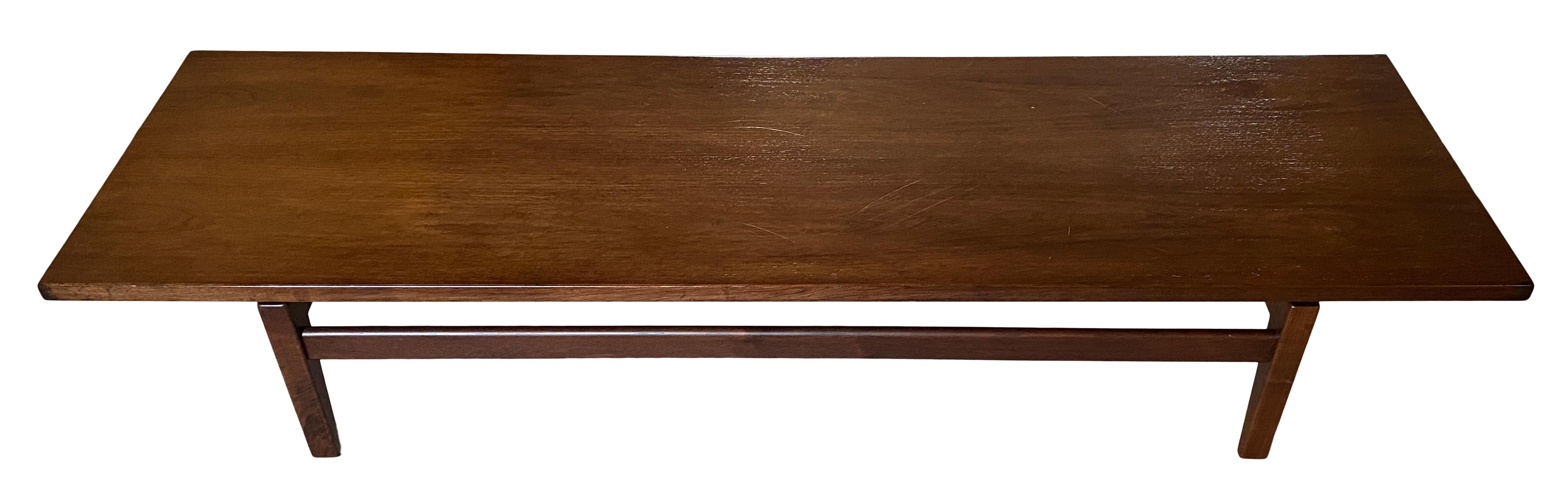 Midcentury Jens Risom design 6’ long walnut floating coffee table bench. Beautiful design and shape. Has floating top design coffee table top. Labeled Jens Risom Design. Great refinished condition, very solid and sturdy, can be used as a coffee