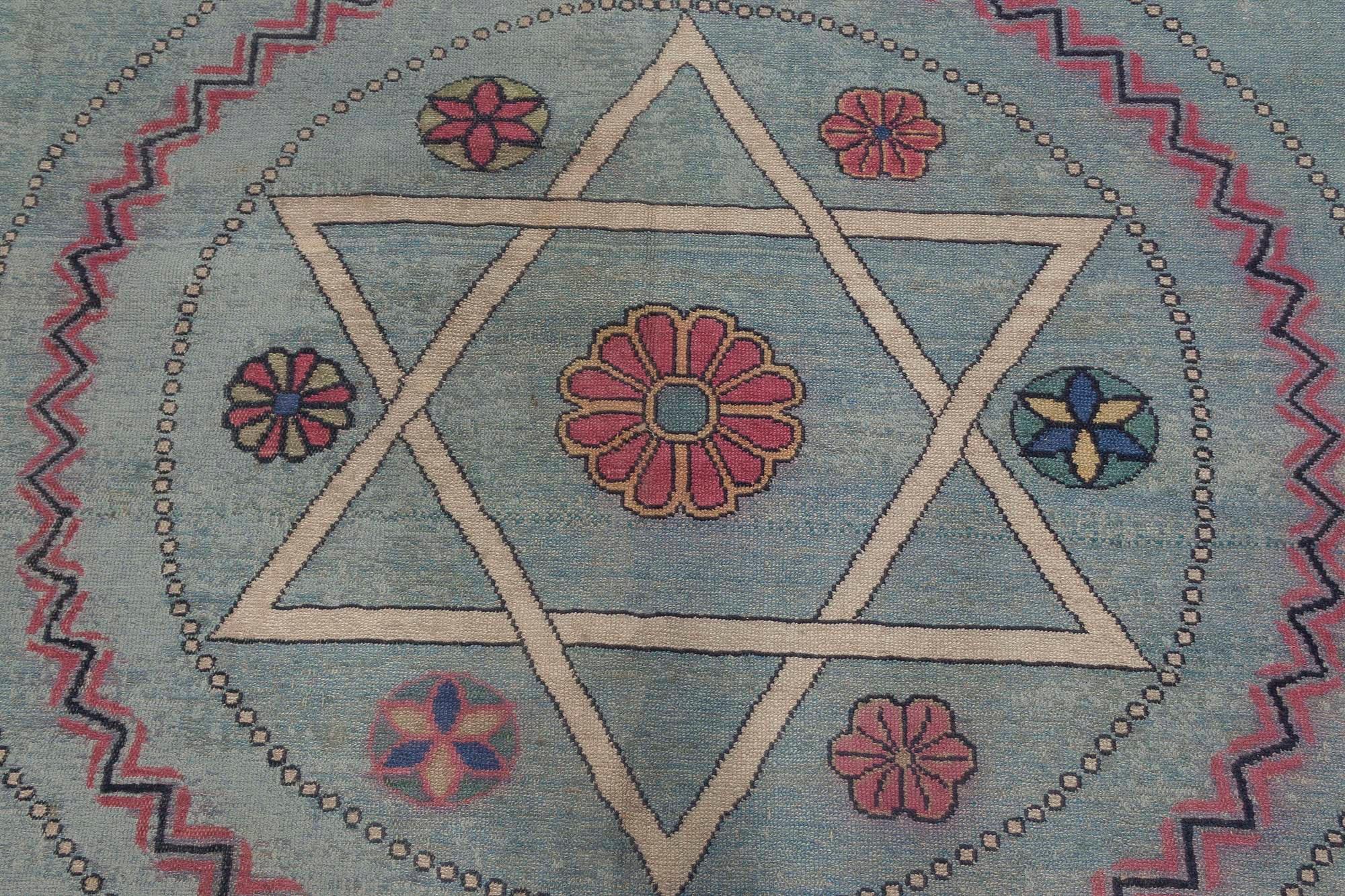 Jews David Star blue and red handwoven wool Marbadia rug
Size: 12'5