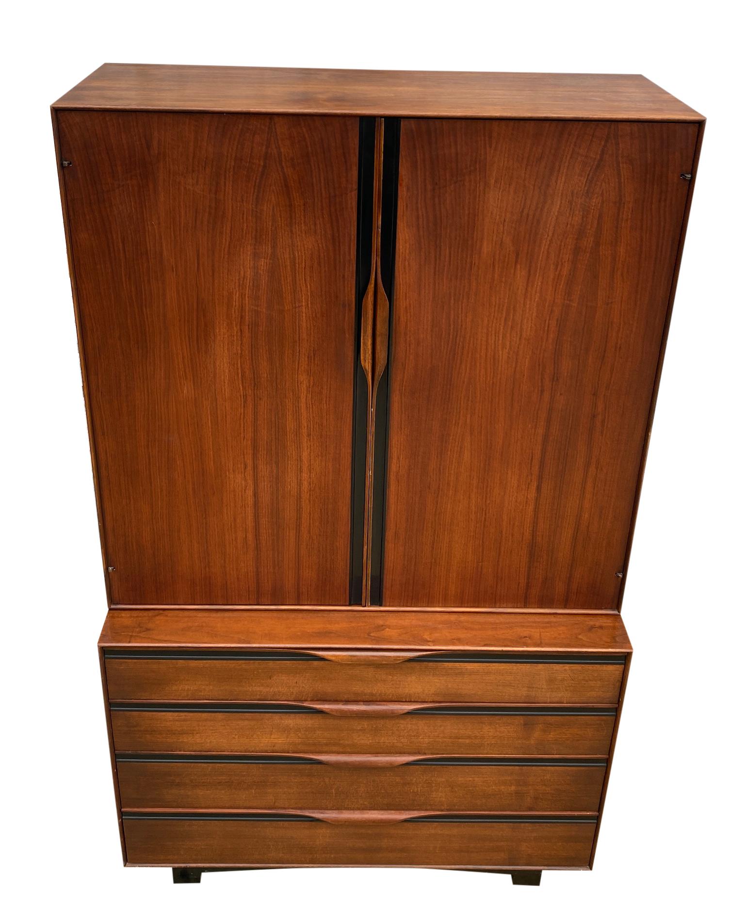 Beautiful midcentury John Kapel for Glenn of California tall walnut and black lacquer dresser wardrobe. Very clean all original 2 section dresser or wardrobe with all drawer dividers. Beautiful sculpted handles. All lower drawers are on metal glides