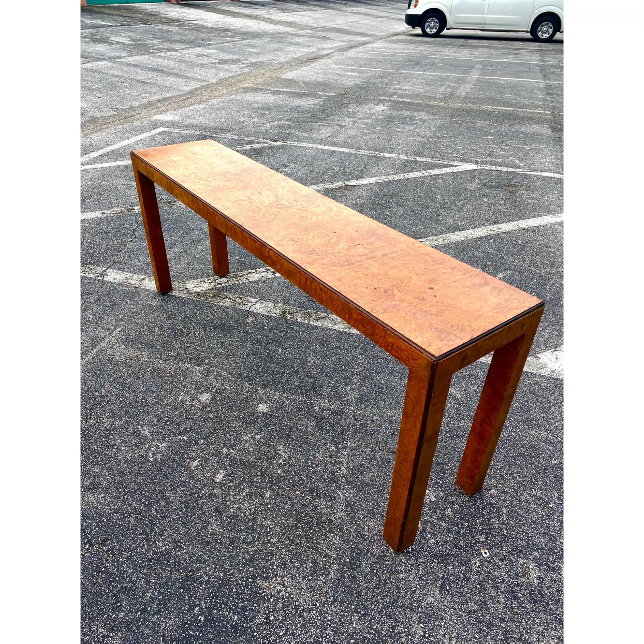 Vintage Midcentury John Widdicomb burl wood console. Long and sexy. Beautiful wood brand detail. A darker deep brown line runs the perimeter of the table top. Tagged on the bottom