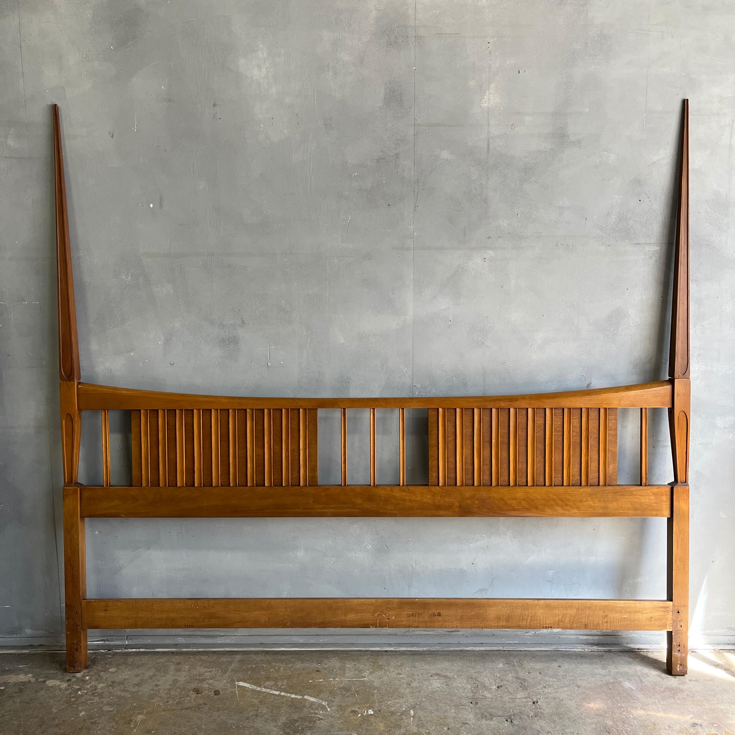 John Widdicomb sculptural tall post king size bed headboard with tapered double spires, circa 1950. Frames show typical age-appropriate signs of use which we have tidied.

Overall dimensions: 79.5