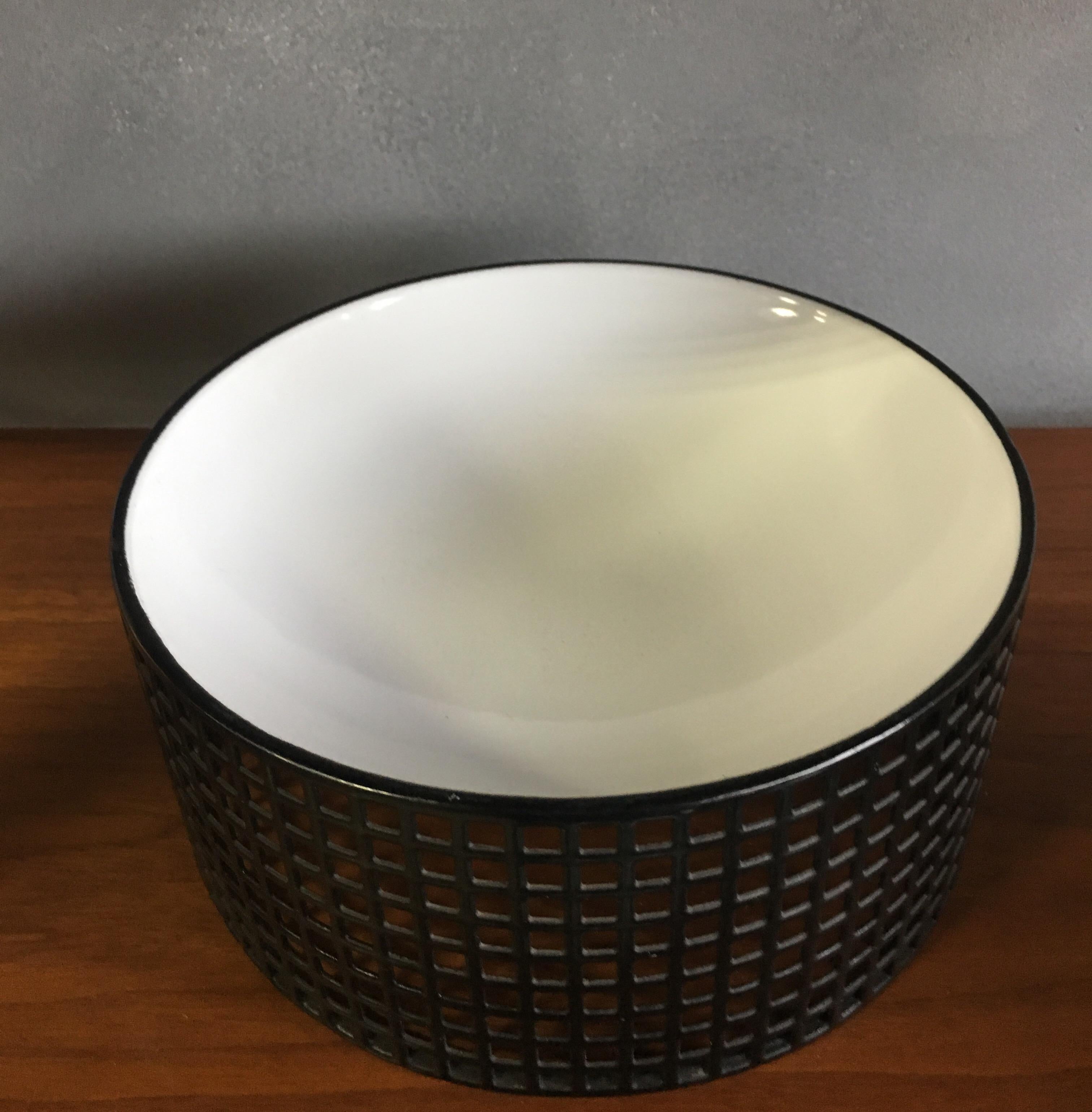 Elegant and strikingly minimal designs by Josef Hoffmann. The bowls/ dish height is 3 1/2 inches and the width is 8 1/2 inches showing very little if any use.