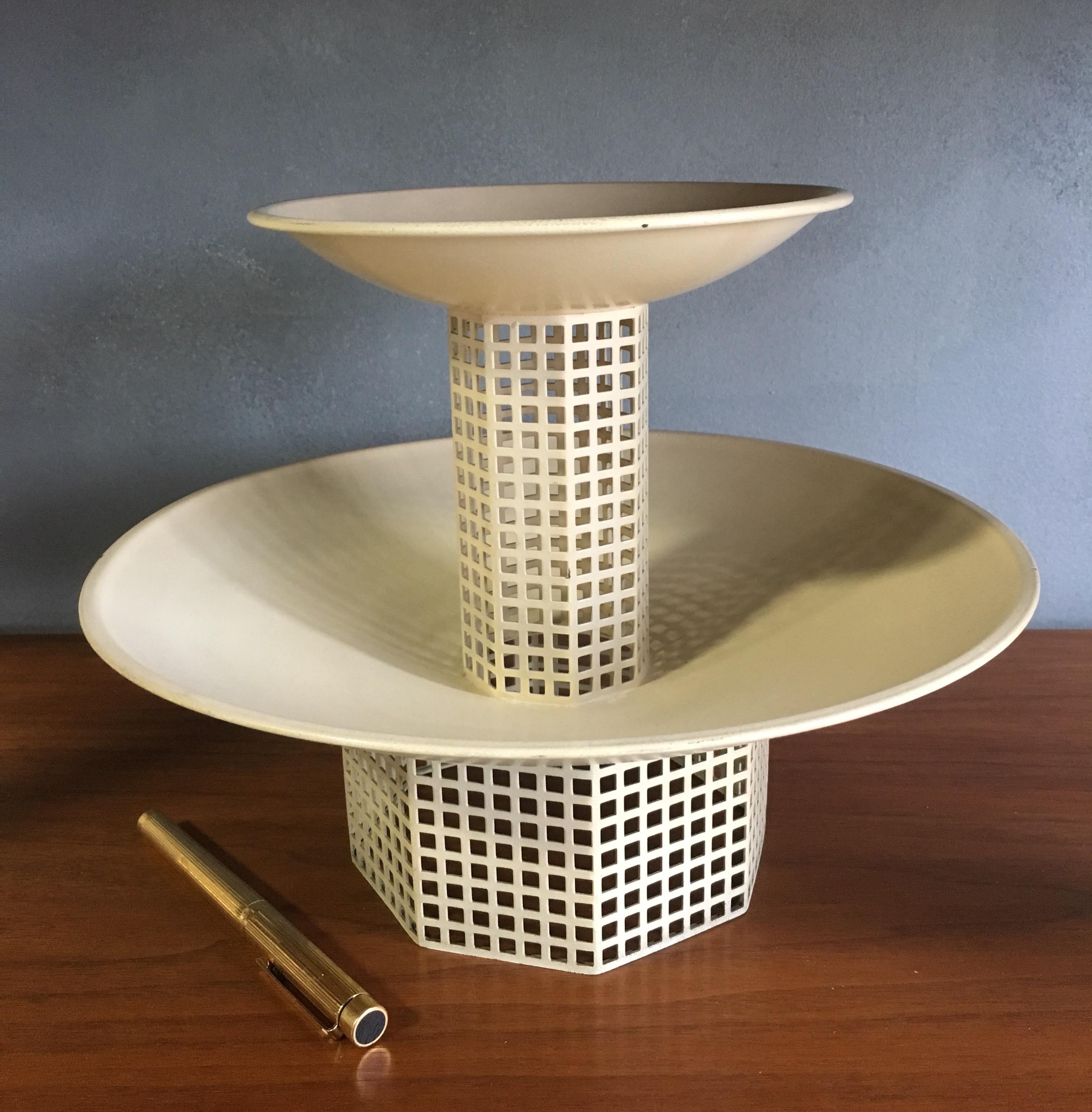 Elegant and strikingly minimal Bauhaus designs by Josef Hoffman. Stands at 8 1/4 inches high. The lower dish is 10 1/2 to inches wide the upper dish is 6 1/2 inches wide. Showing little if any use.